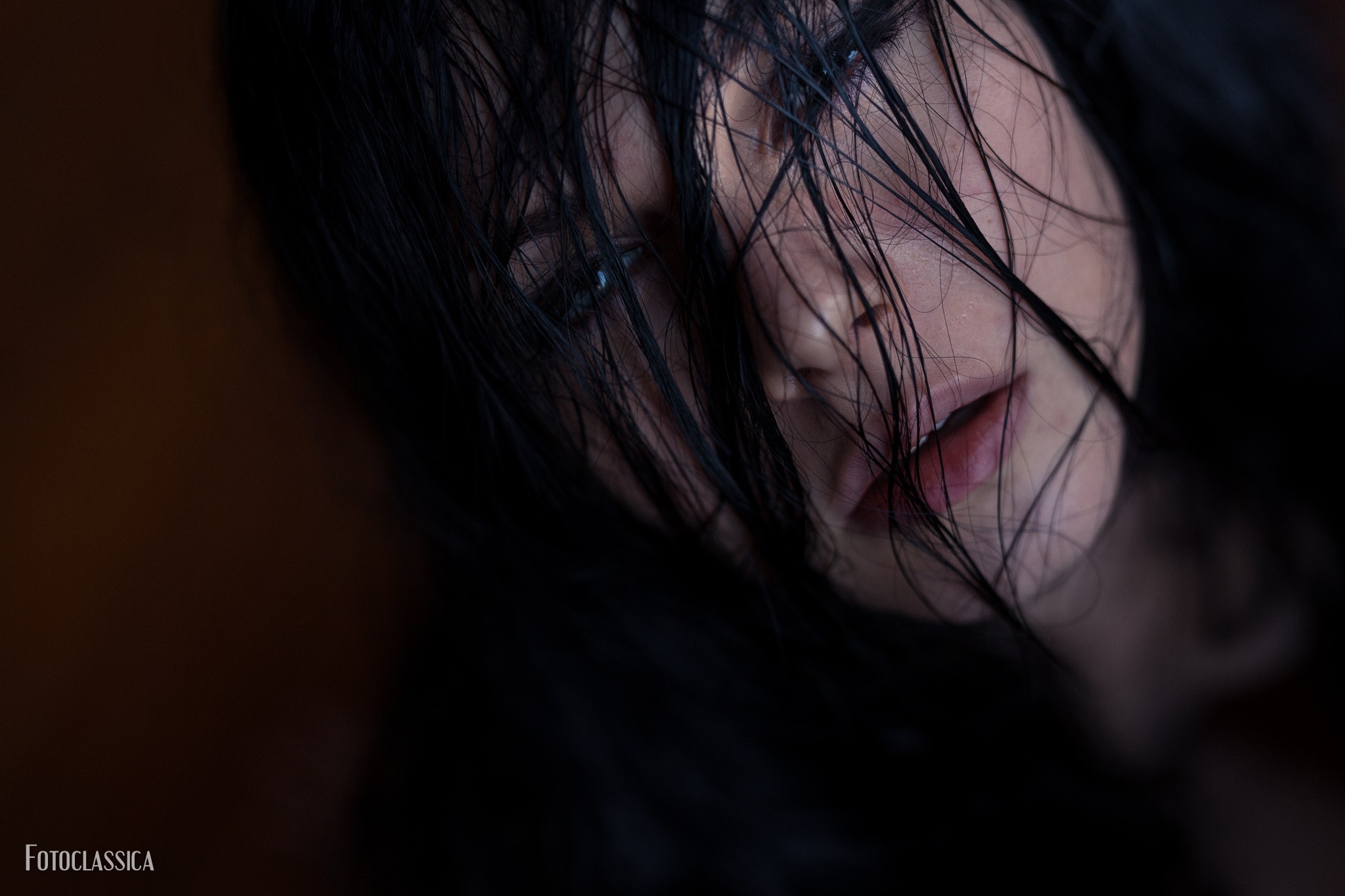 Portrait of a woman with wet hair HD Wallpaper