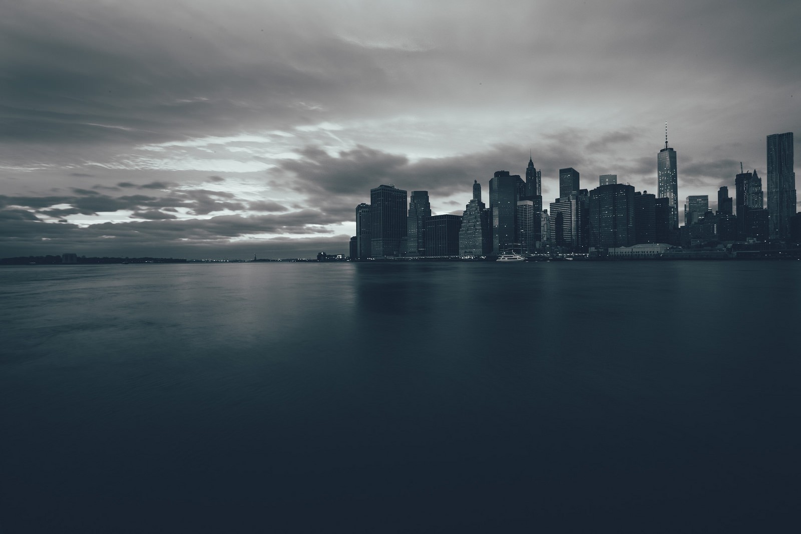 New York City skyline across the water at dusk HD Wallpaper