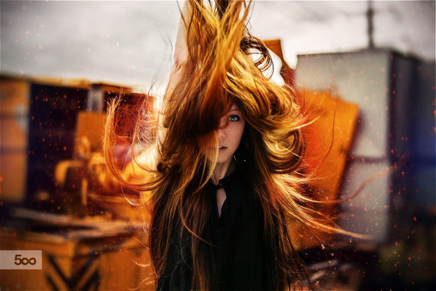Woman with long red hair in front of industrial background HD Wallpaper
