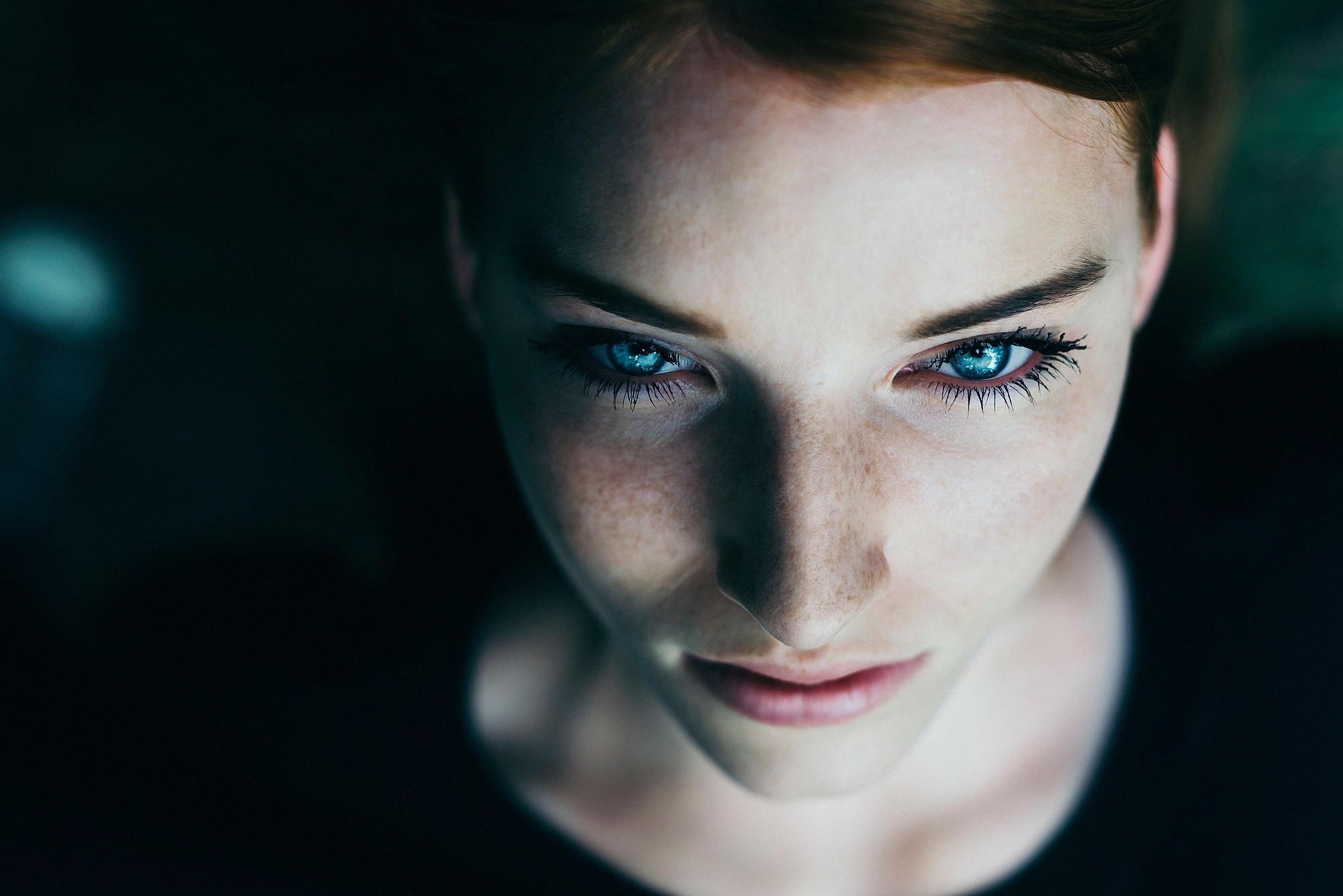 Portrait of a woman with blue eyes and freckles HD Wallpaper