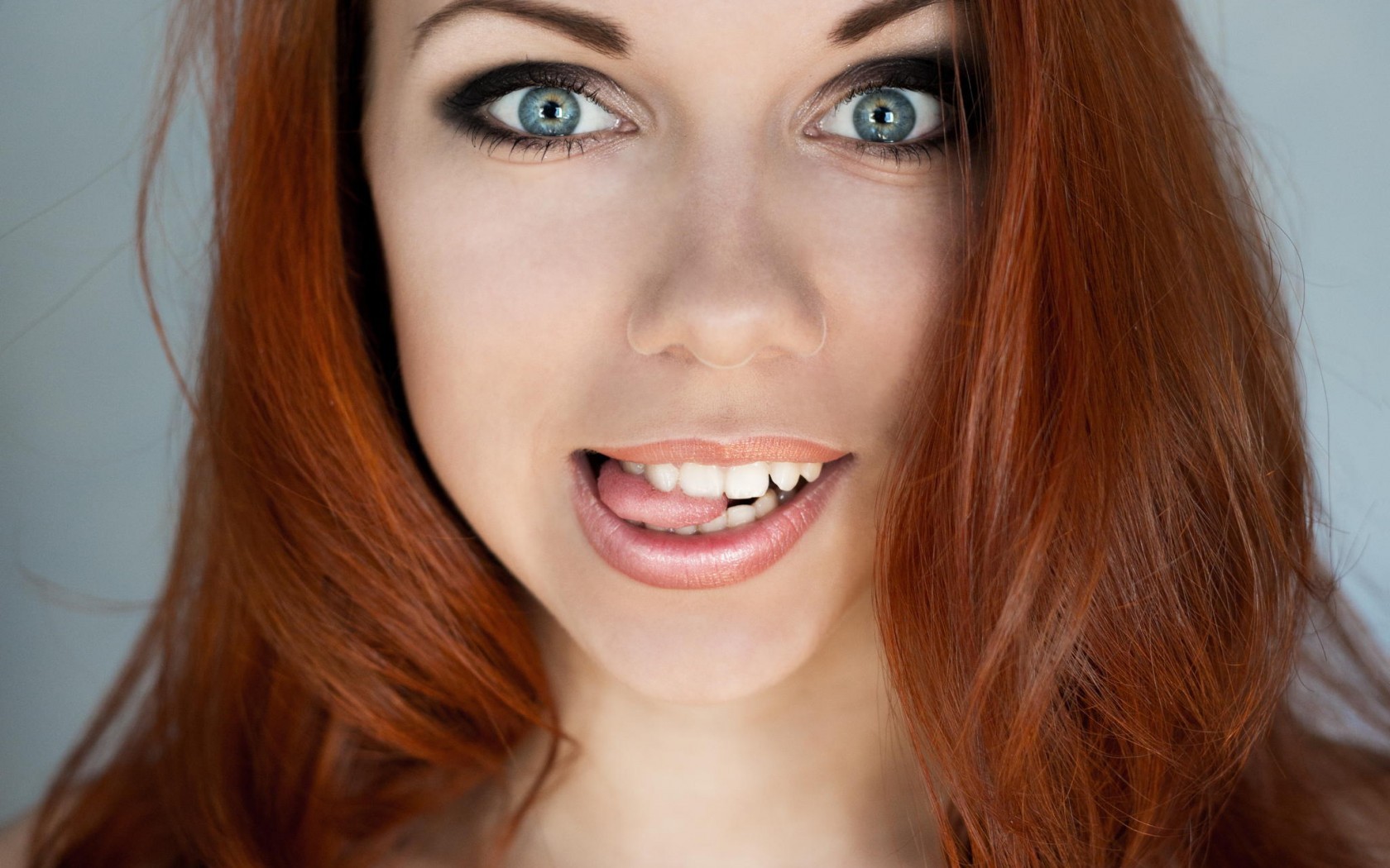Redhead woman with blue eyes and makeup HD Wallpaper