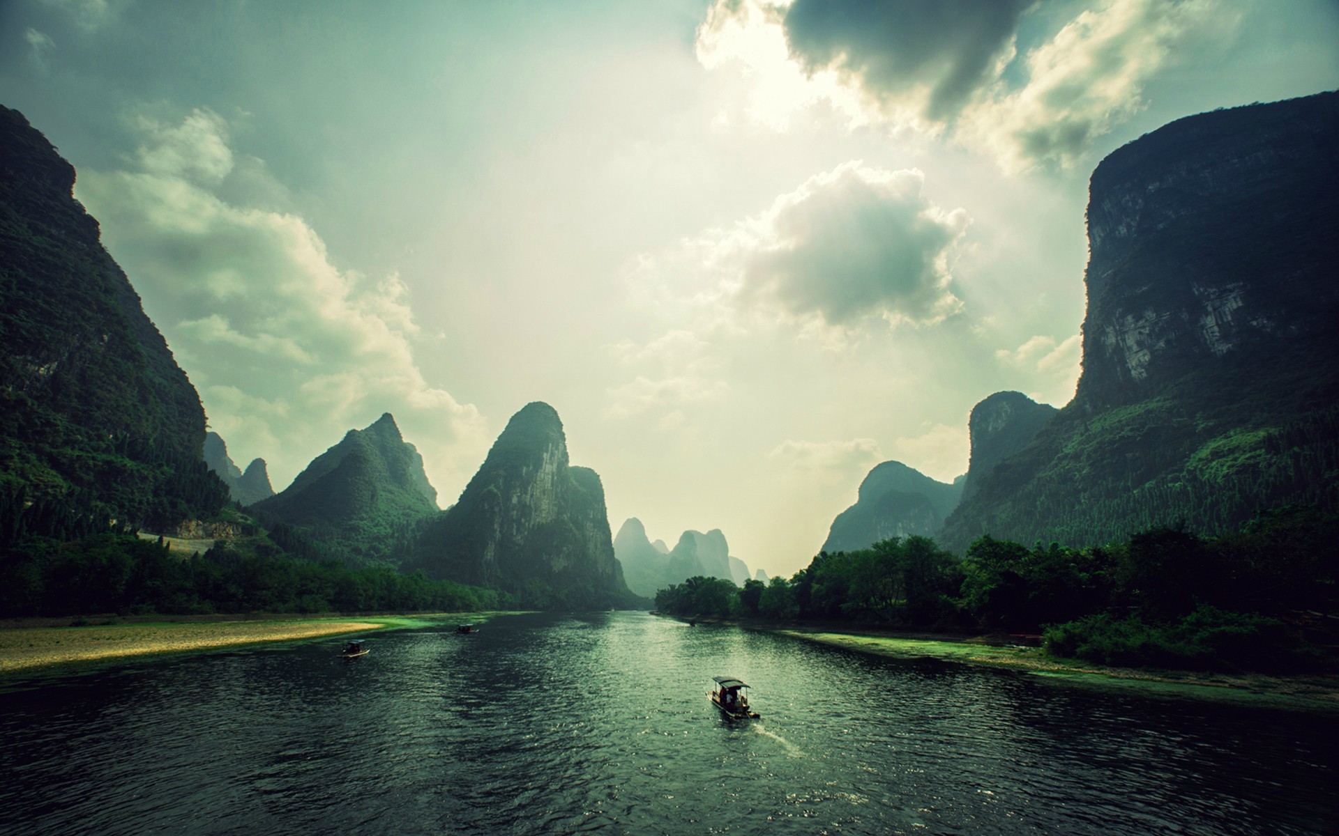 Karst mountains and river with a boat HD Wallpaper