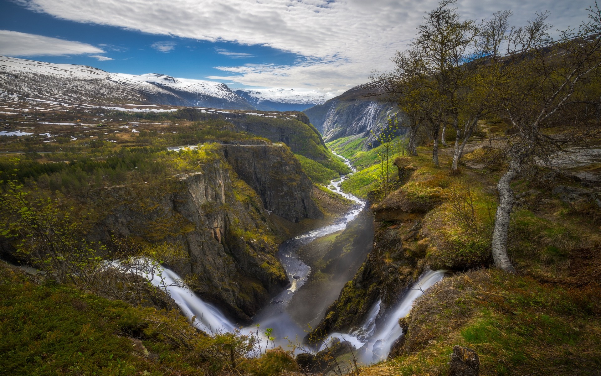 Voringsfossen waterfall in Norway with snowy mountains HD Wallpaper