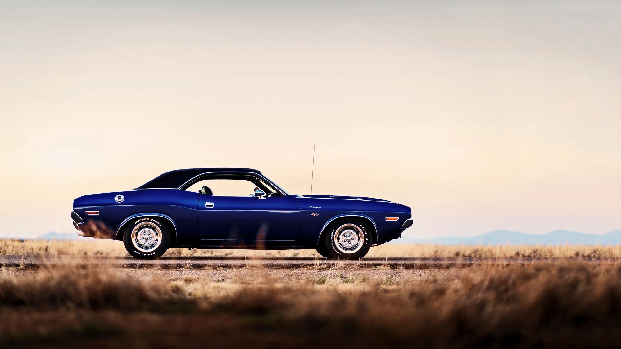 Blue 1970 Dodge Challenger on a dirt road HD Wallpaper