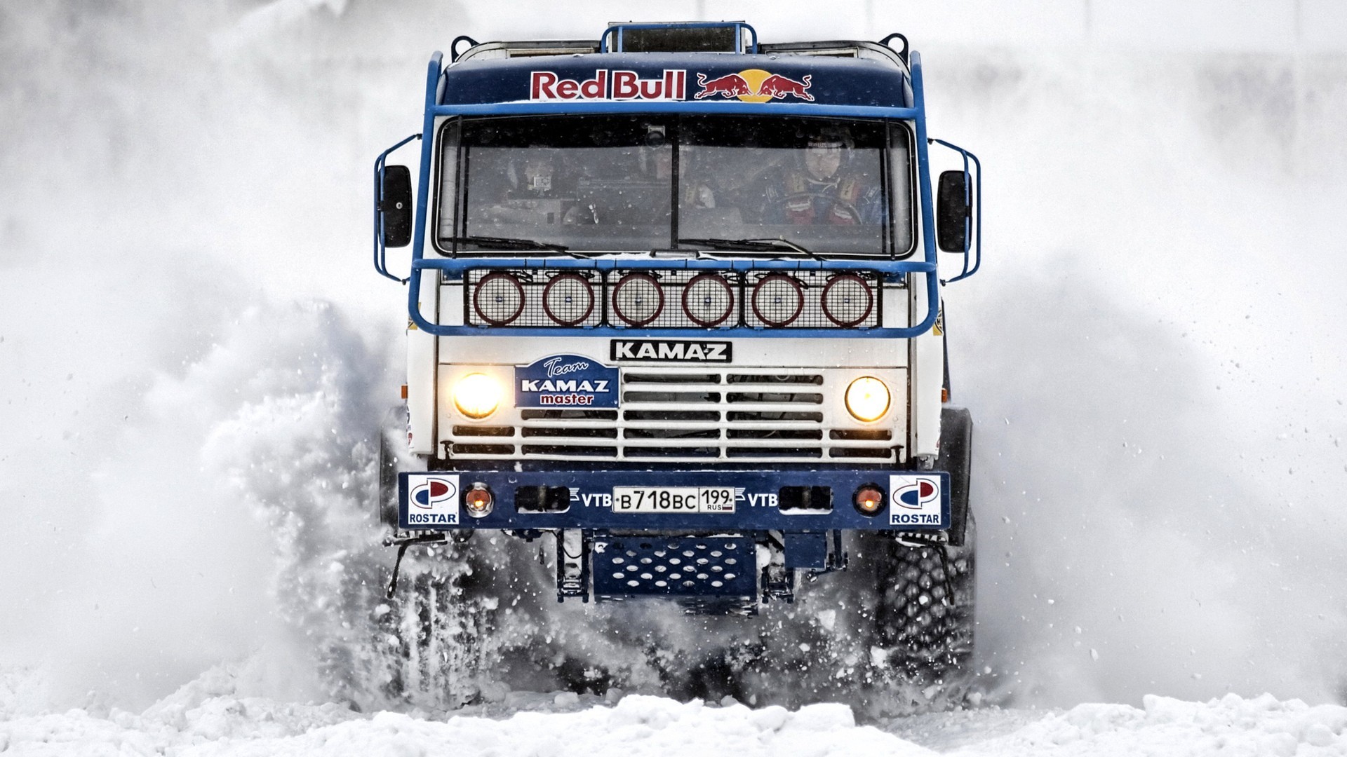 Kamaz truck driving through snow HD Wallpaper