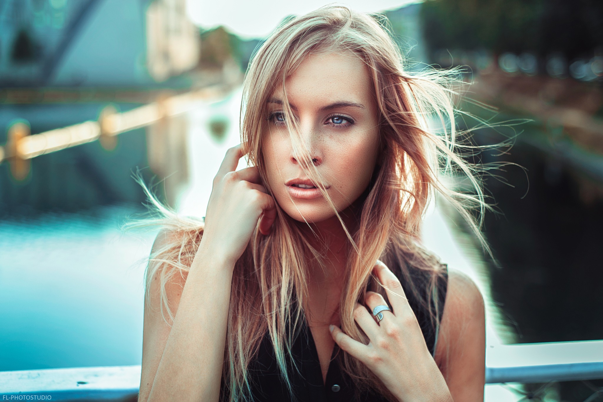 Portrait of a blonde woman with blue eyes HD Wallpaper