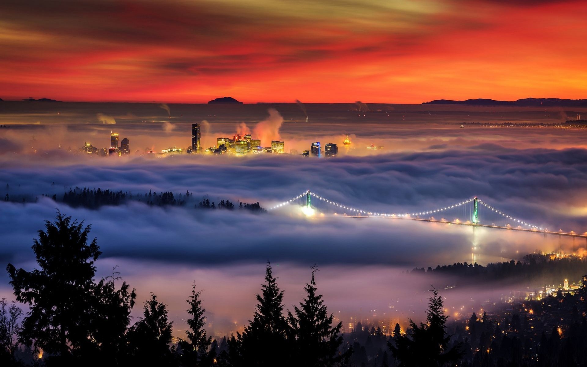 Vancouver cityscape shrouded in mist at sunset HD Wallpaper