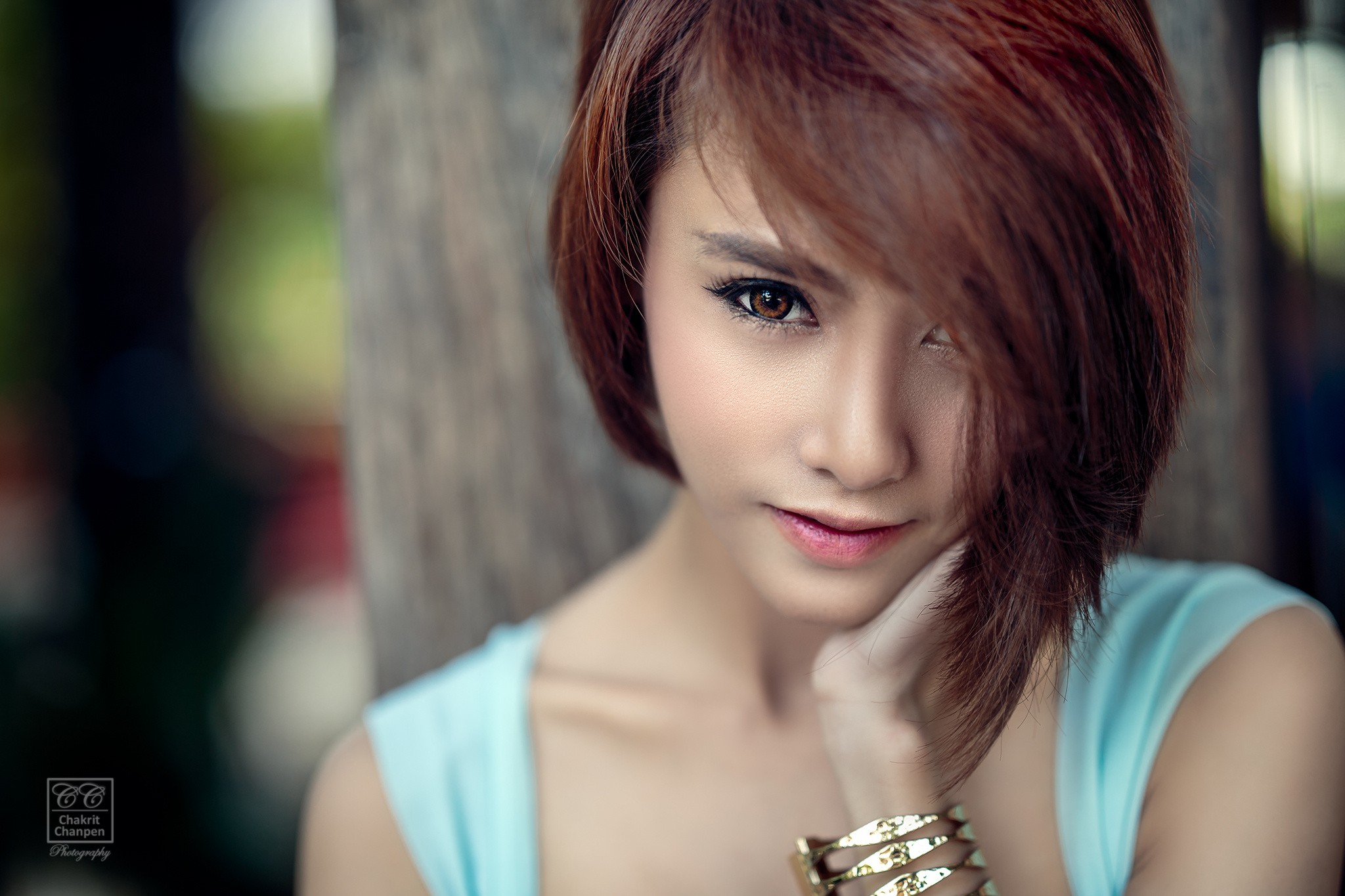 Asian woman with auburn hair in a light blue top HD Wallpaper