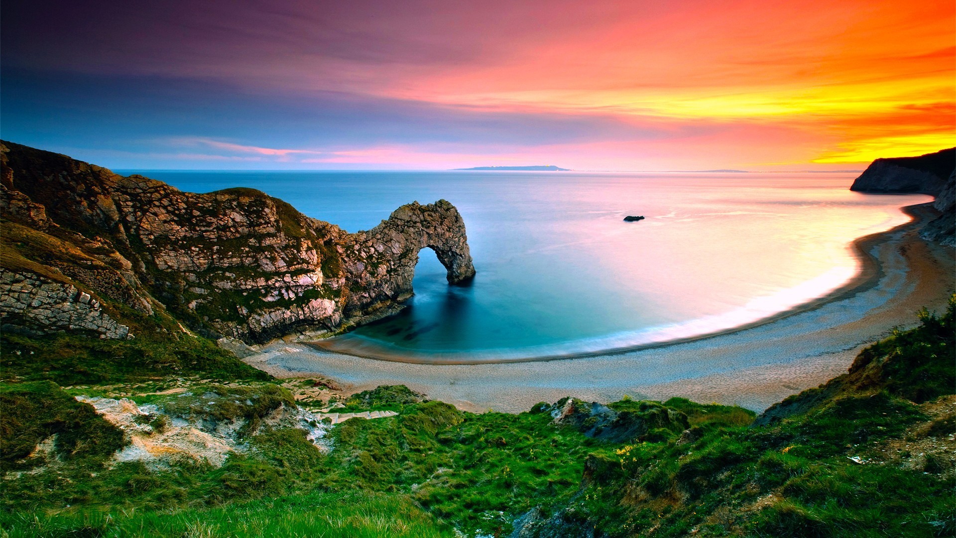 Durdle Door at sunset with colorful sky HD Wallpaper