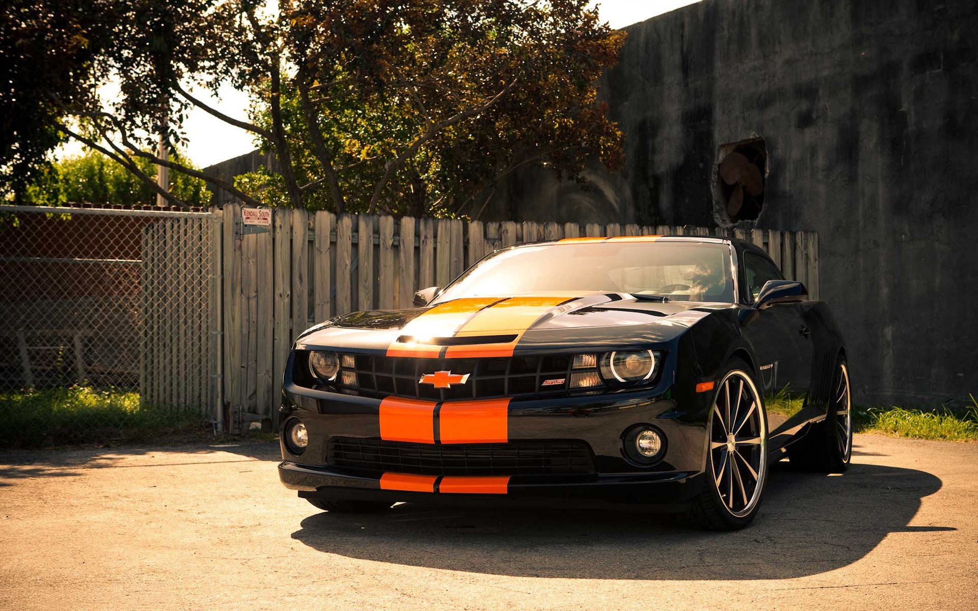 Black Chevrolet Camaro with orange stripes HD Wallpaper