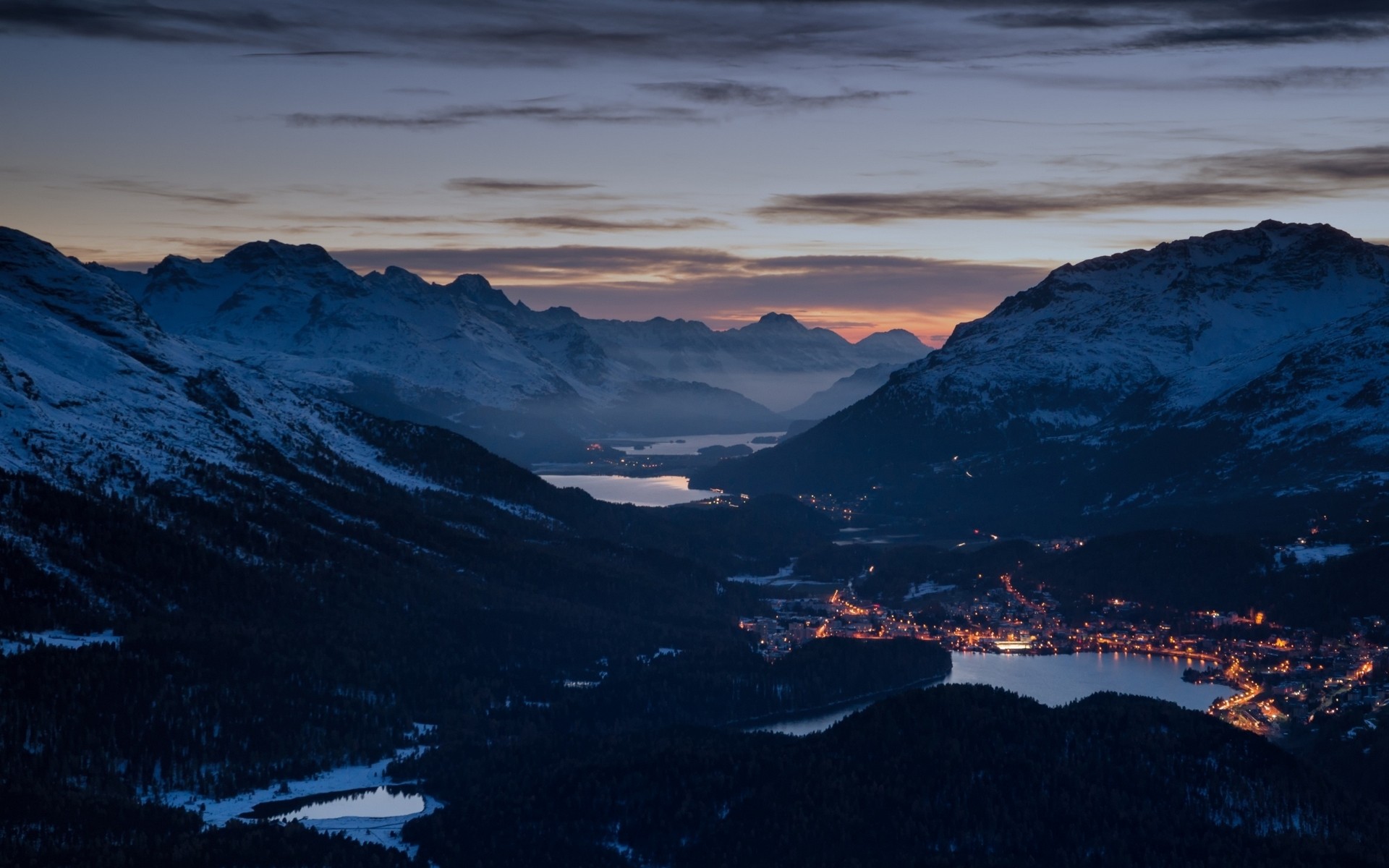 Evening in the Swiss Alps with a village by the lake HD Wallpaper
