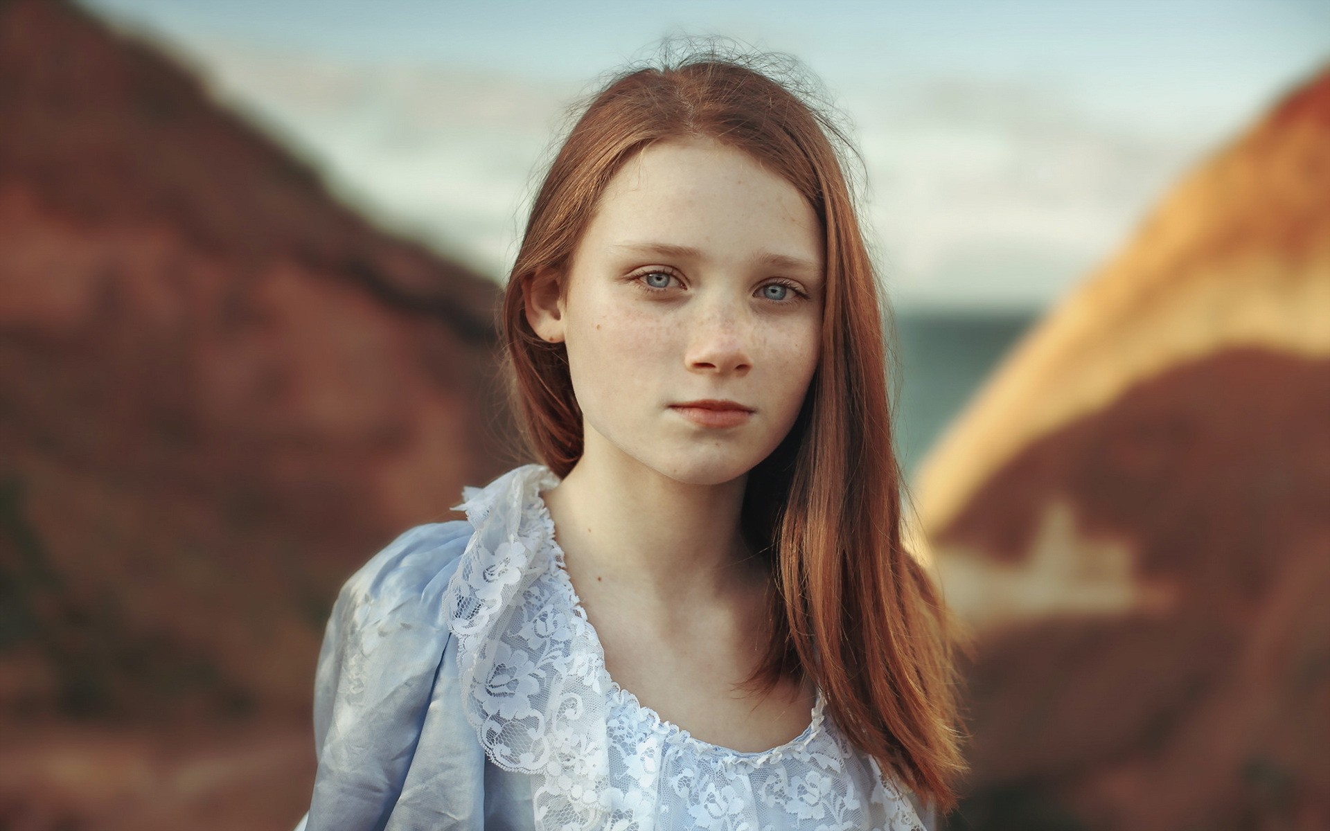 Young redhead girl with blue eyes and freckles HD Wallpaper