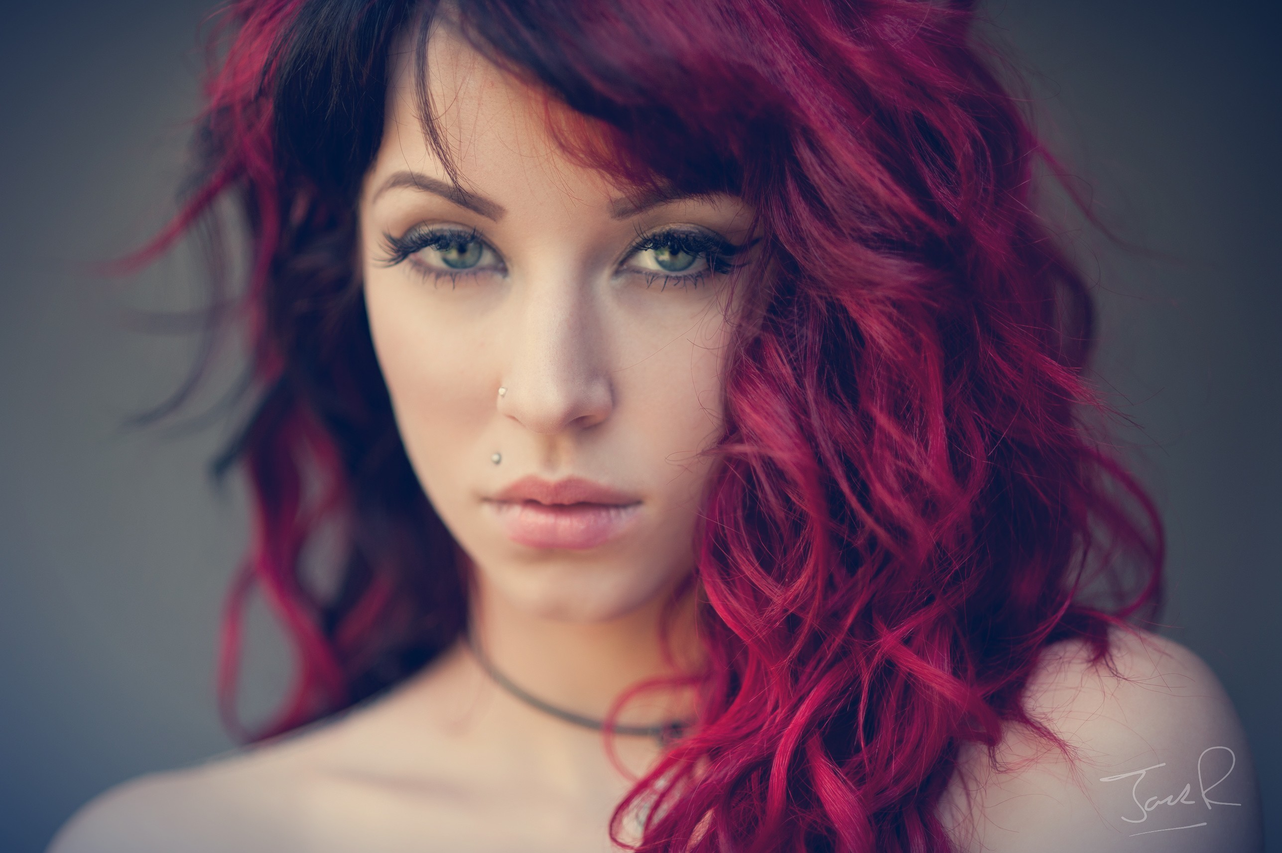 Portrait of a woman with red hair and piercings HD Wallpaper