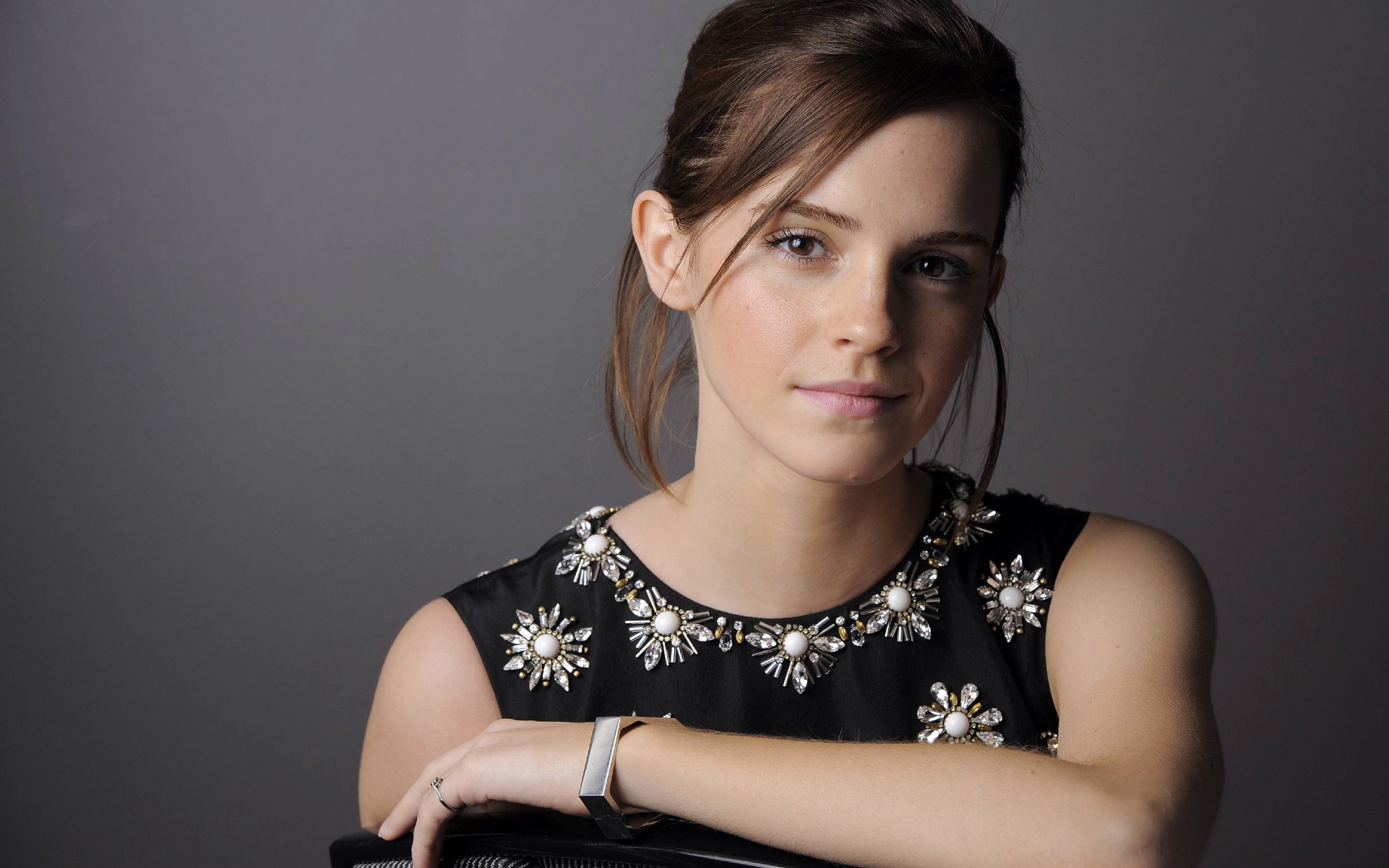 Emma Watson posing for a portrait HD Wallpaper
