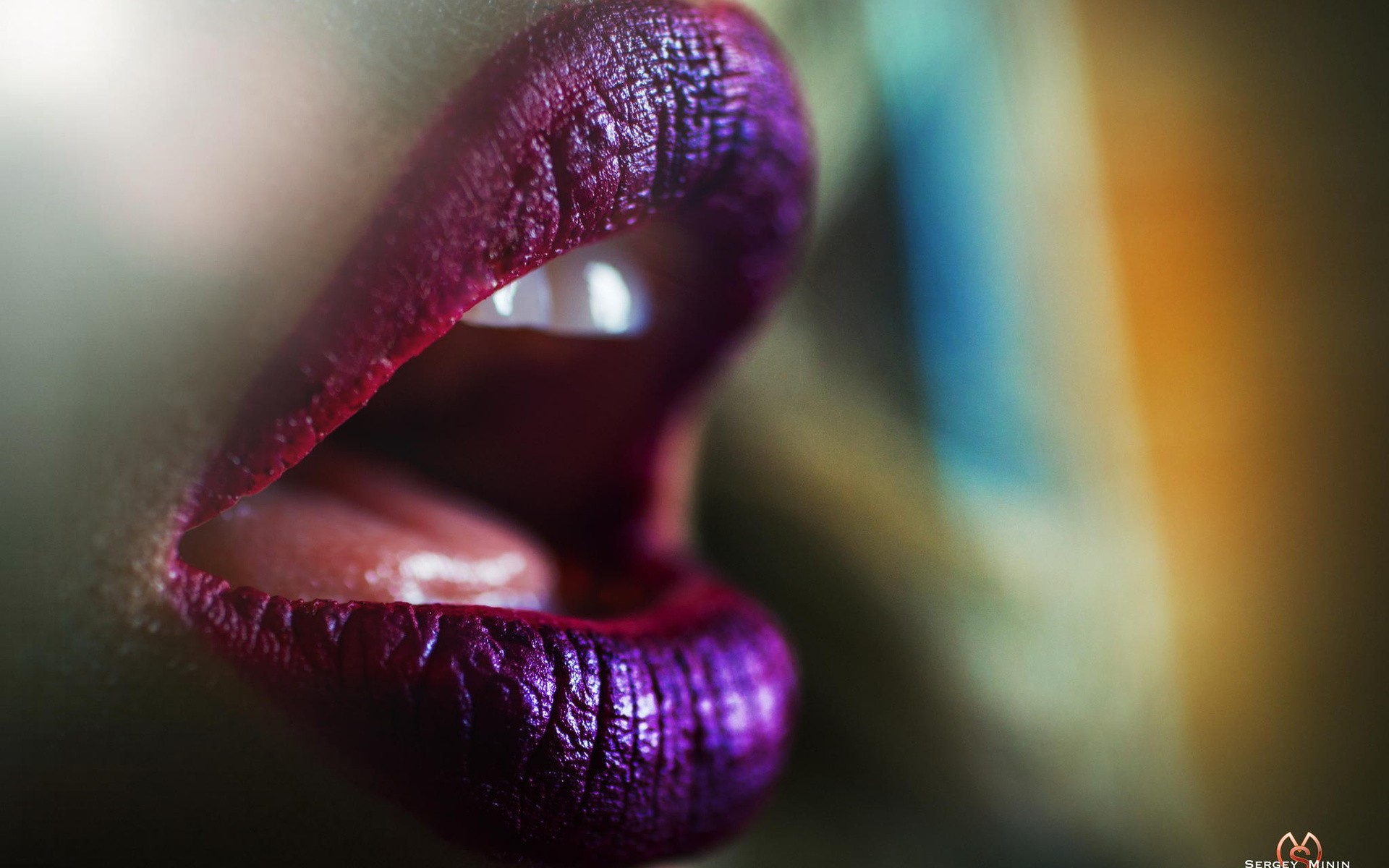 Close-up of woman's lips with purple lipstick by Sergey Minin HD Wallpaper