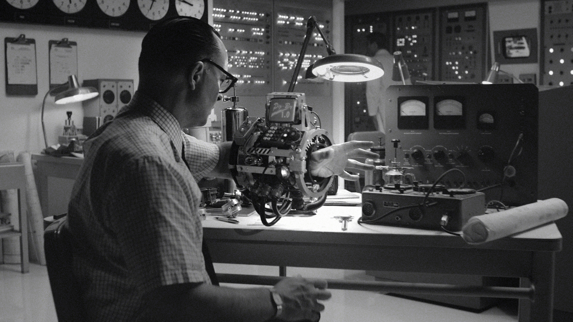 Man with Pip-Boy in a retro-futuristic lab HD Wallpaper