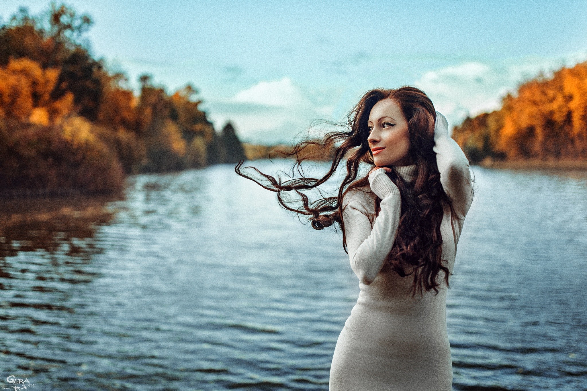 Woman with long hair by the water in autumn HD Wallpaper