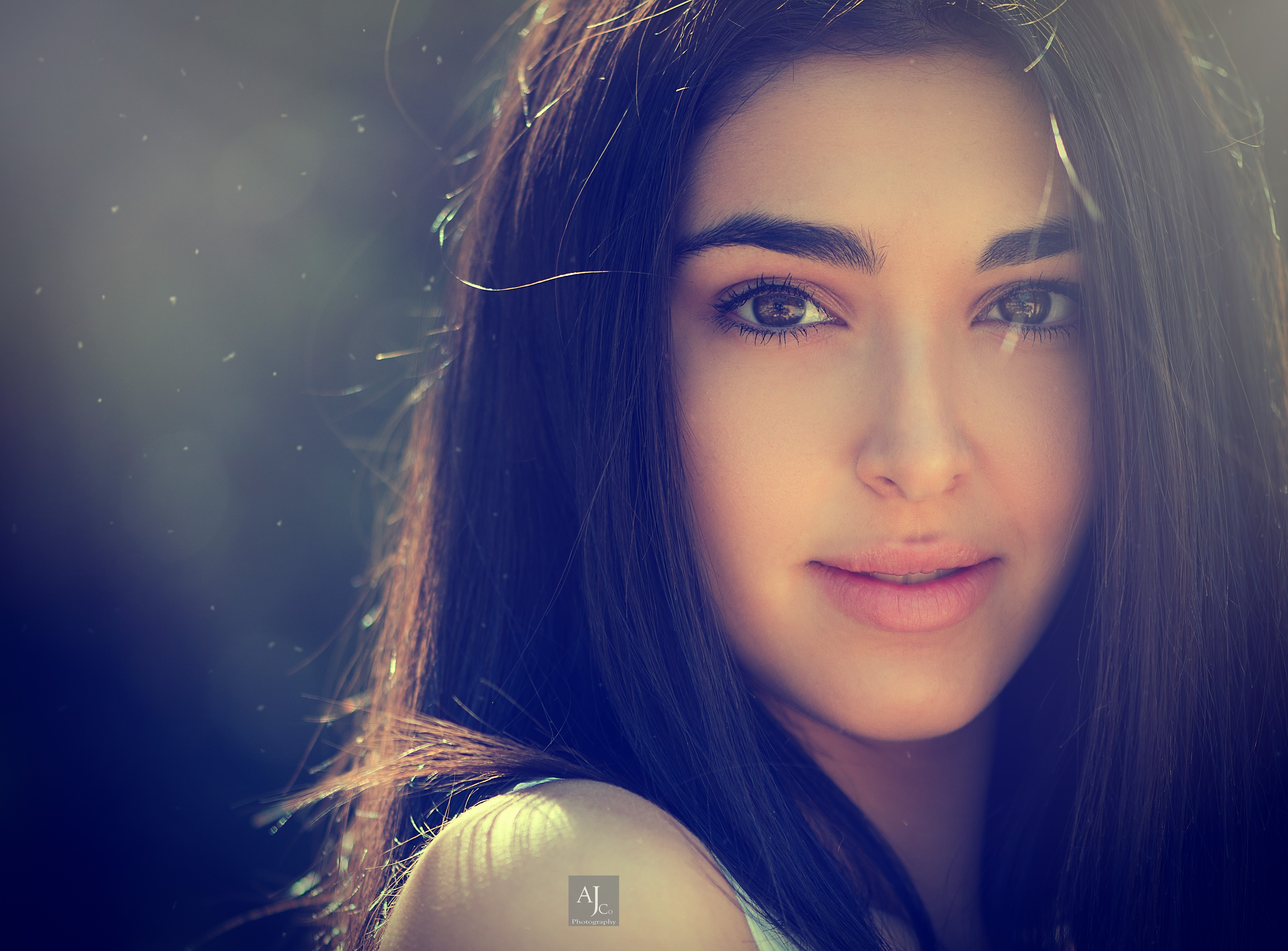 Portrait of a young woman with dark hair HD Wallpaper