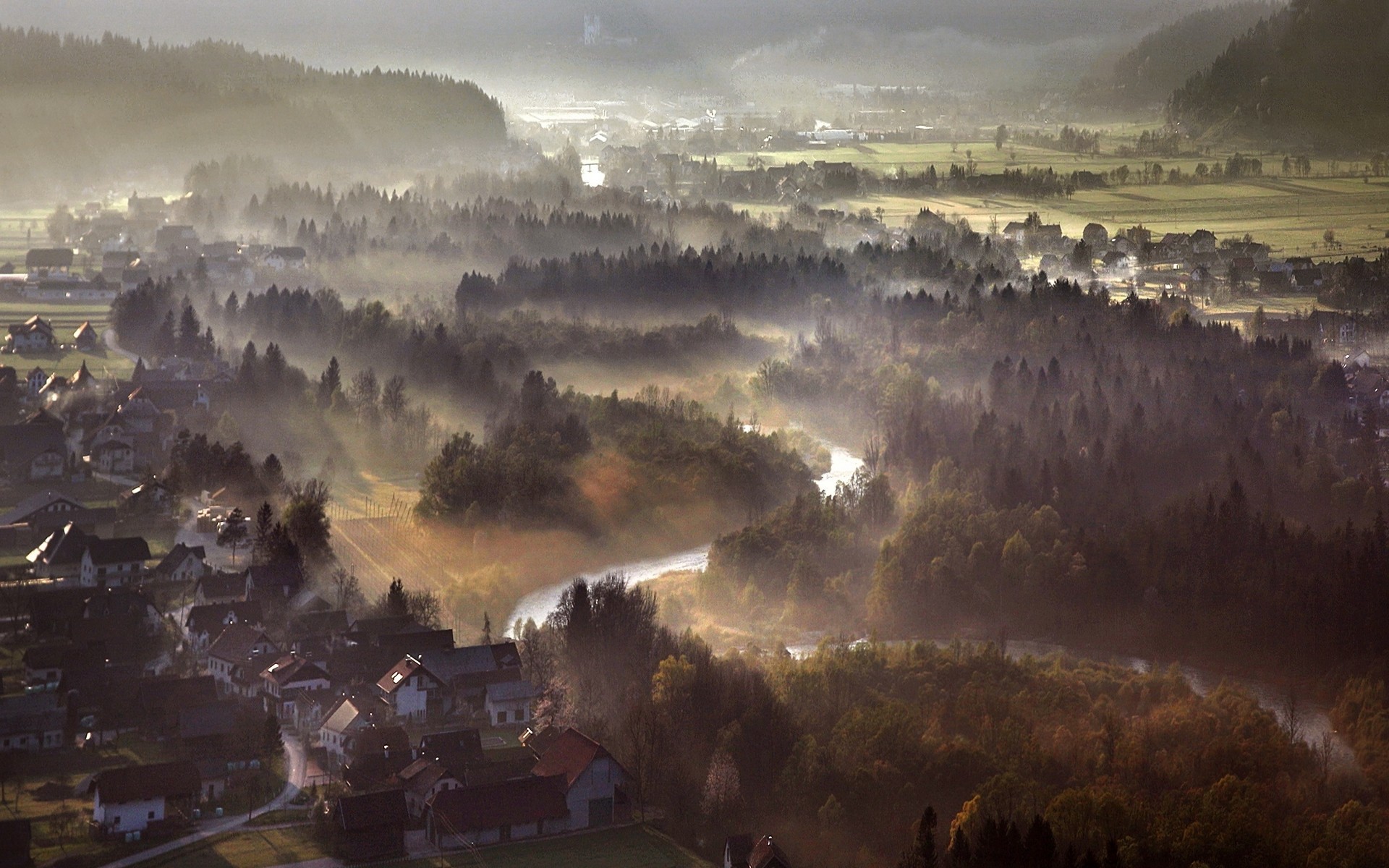 Misty morning aerial view of a town and river HD Wallpaper