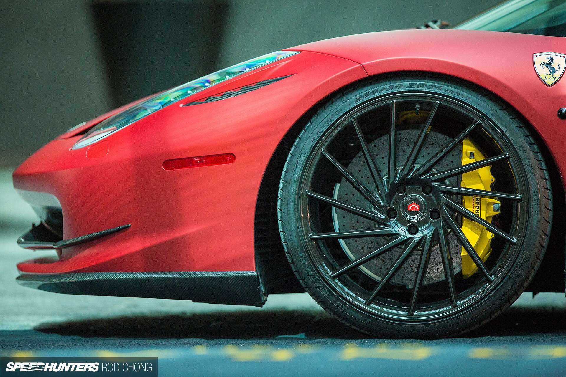 Red Ferrari car with custom black wheels HD Wallpaper