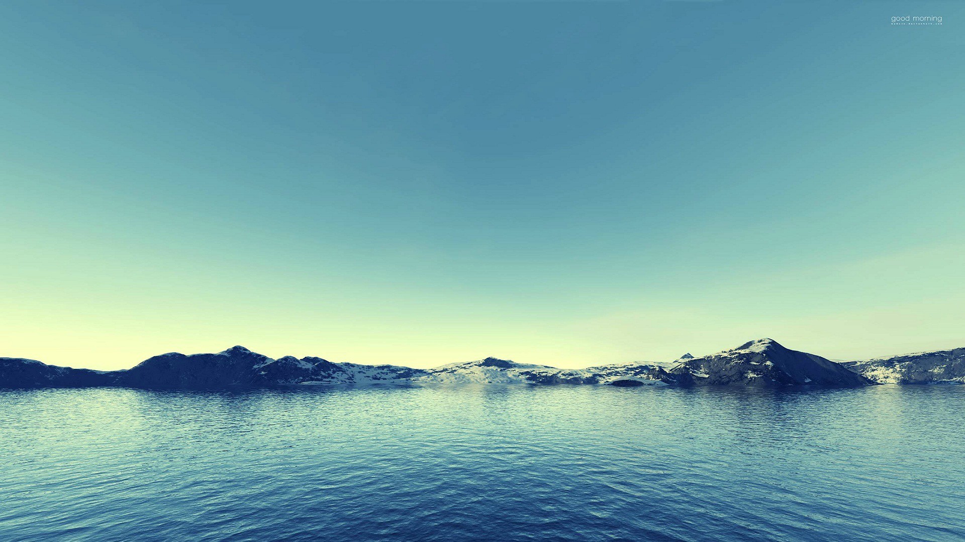 Calm sea and snow-capped mountains under a clear sky HD Wallpaper