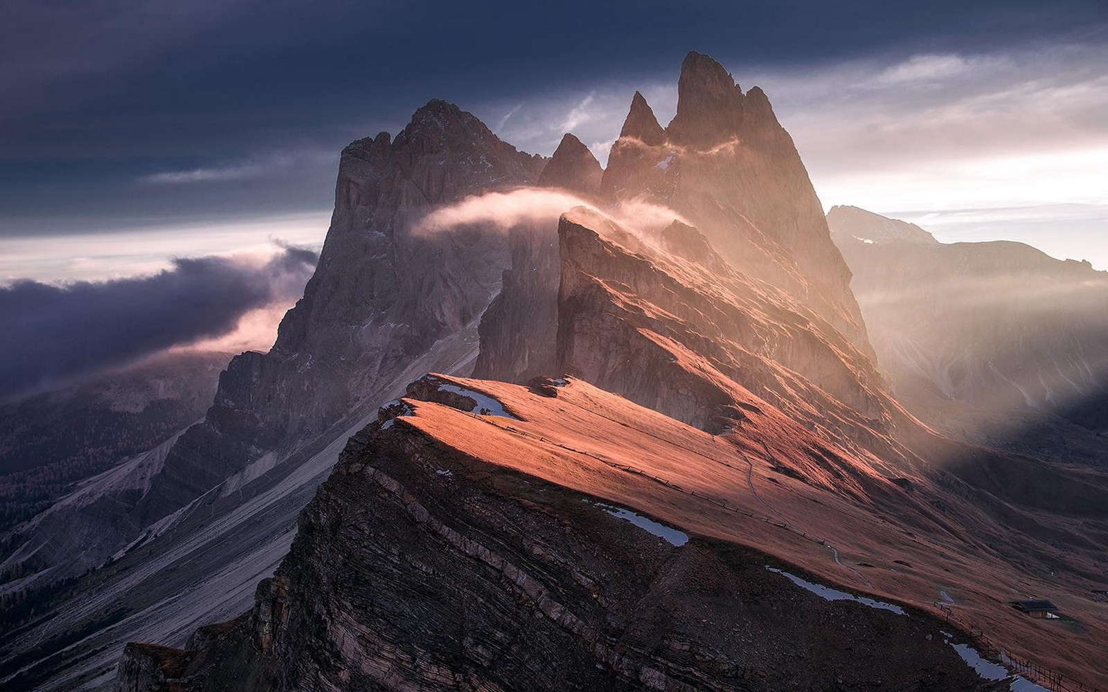 Sunlight on jagged peaks of the Dolomites mountains HD Wallpaper