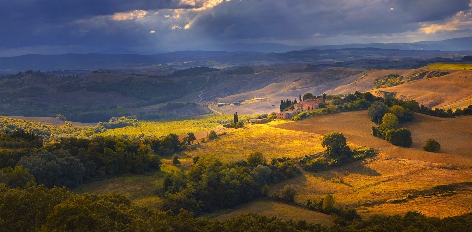 Tuscany landscape with rolling hills and sunlight HD Wallpaper