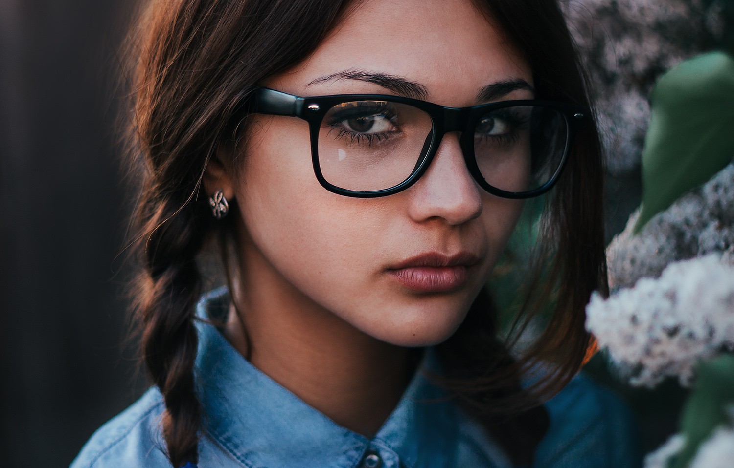 Portrait of a young woman with glasses and braids HD Wallpaper
