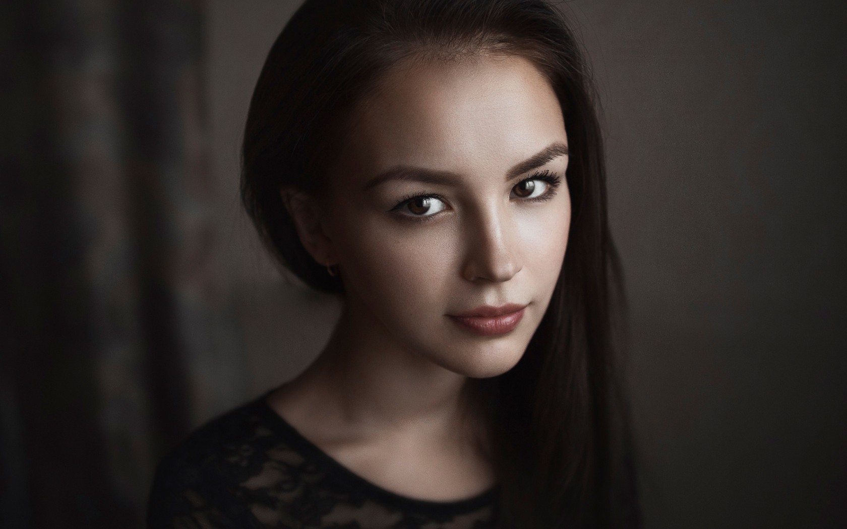 Portrait of a woman with dark hair HD Wallpaper