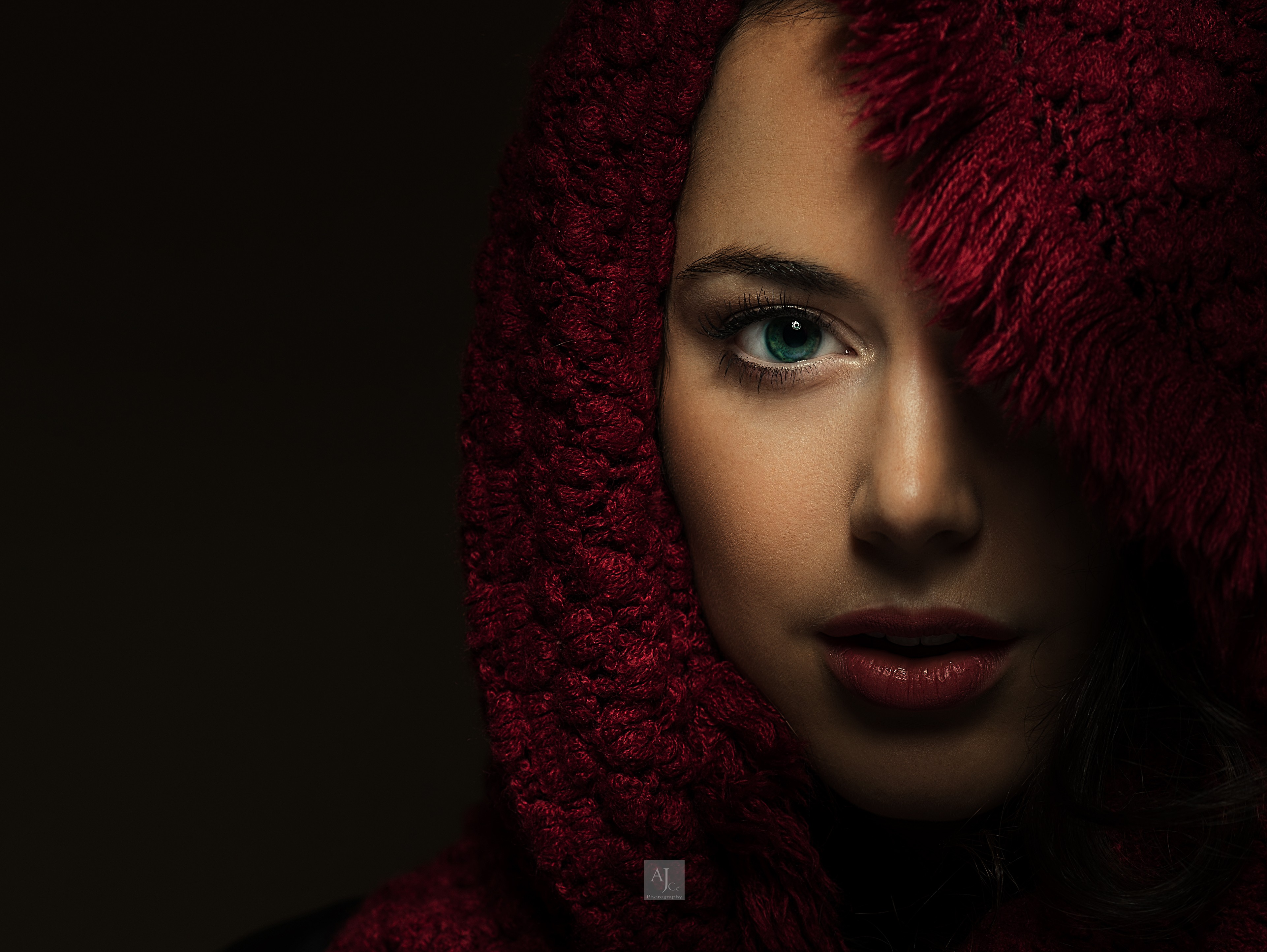 Woman with blue eye and red scarf HD Wallpaper