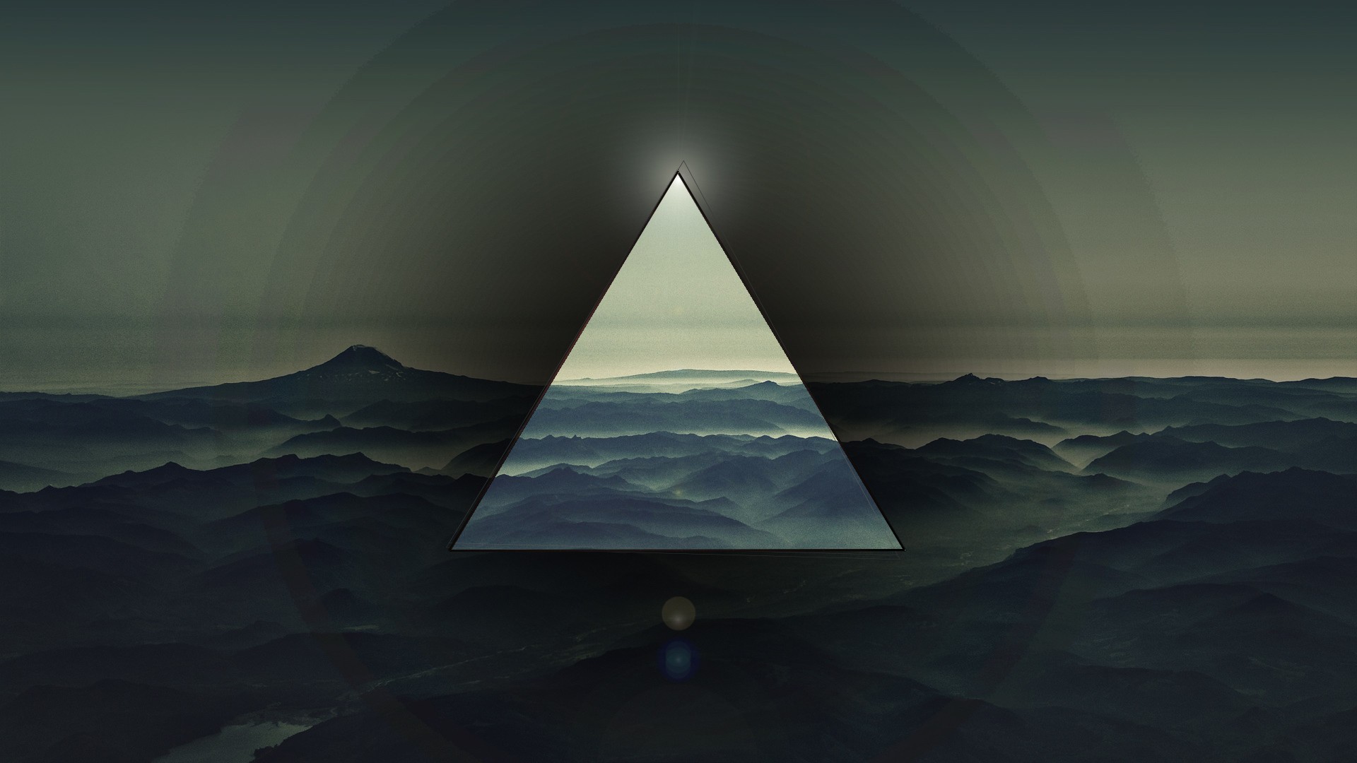 Abstract triangle over misty mountains HD Wallpaper