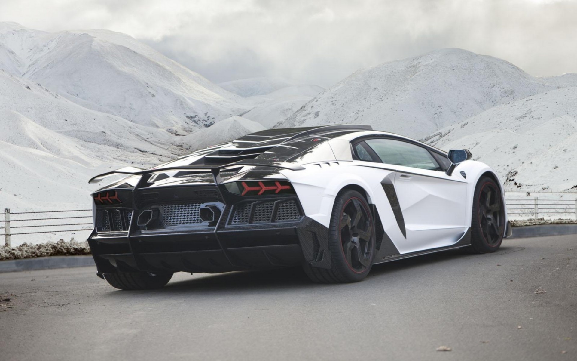White Lamborghini Aventador in Snowy Mountains HD Wallpaper
