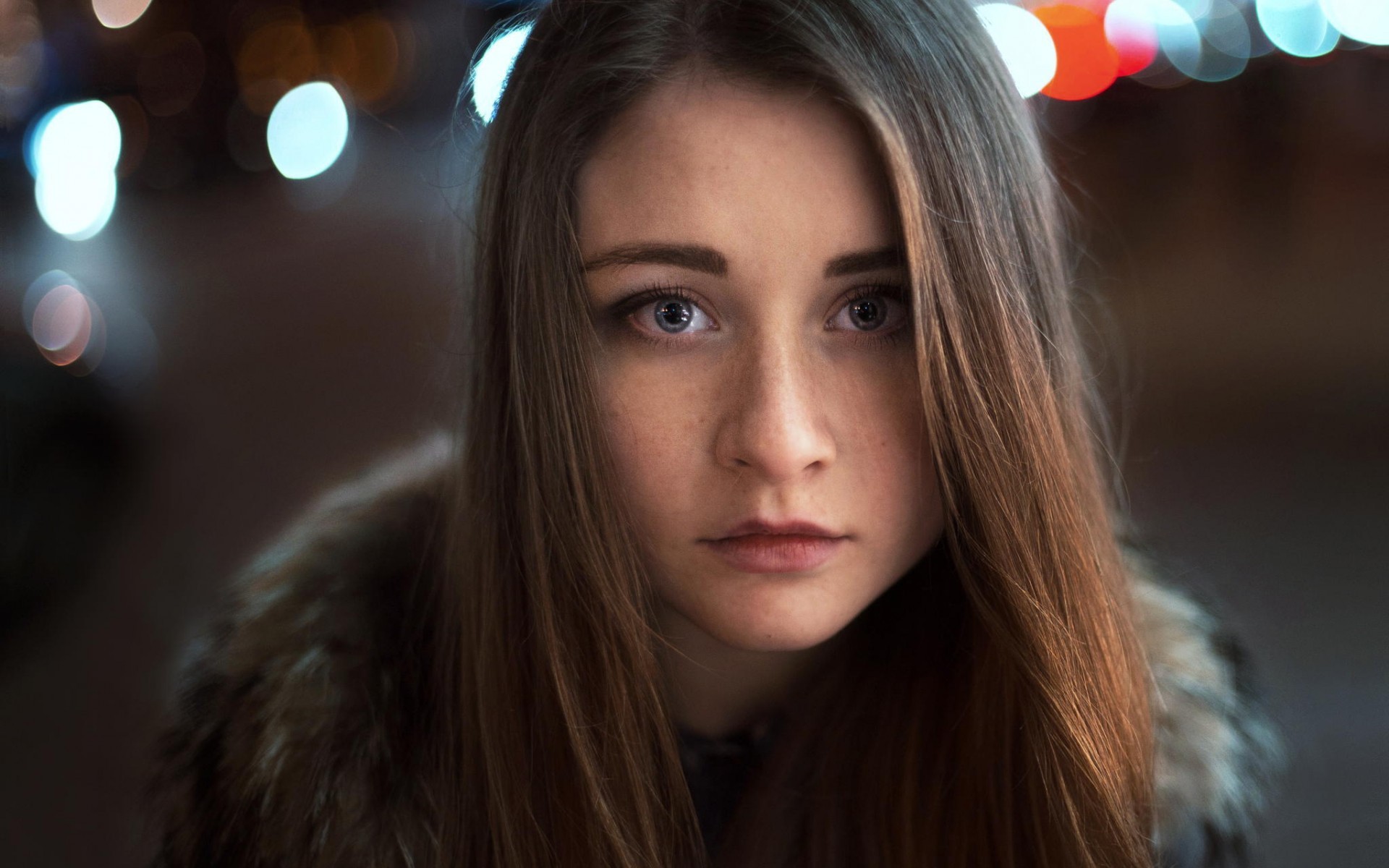 Woman with brown hair and fur collar HD Wallpaper
