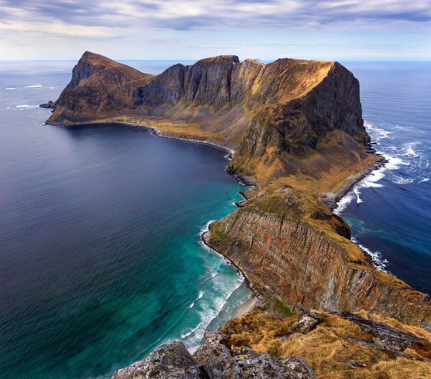 Rocky peninsula jutting into the sea in Norway HD Wallpaper