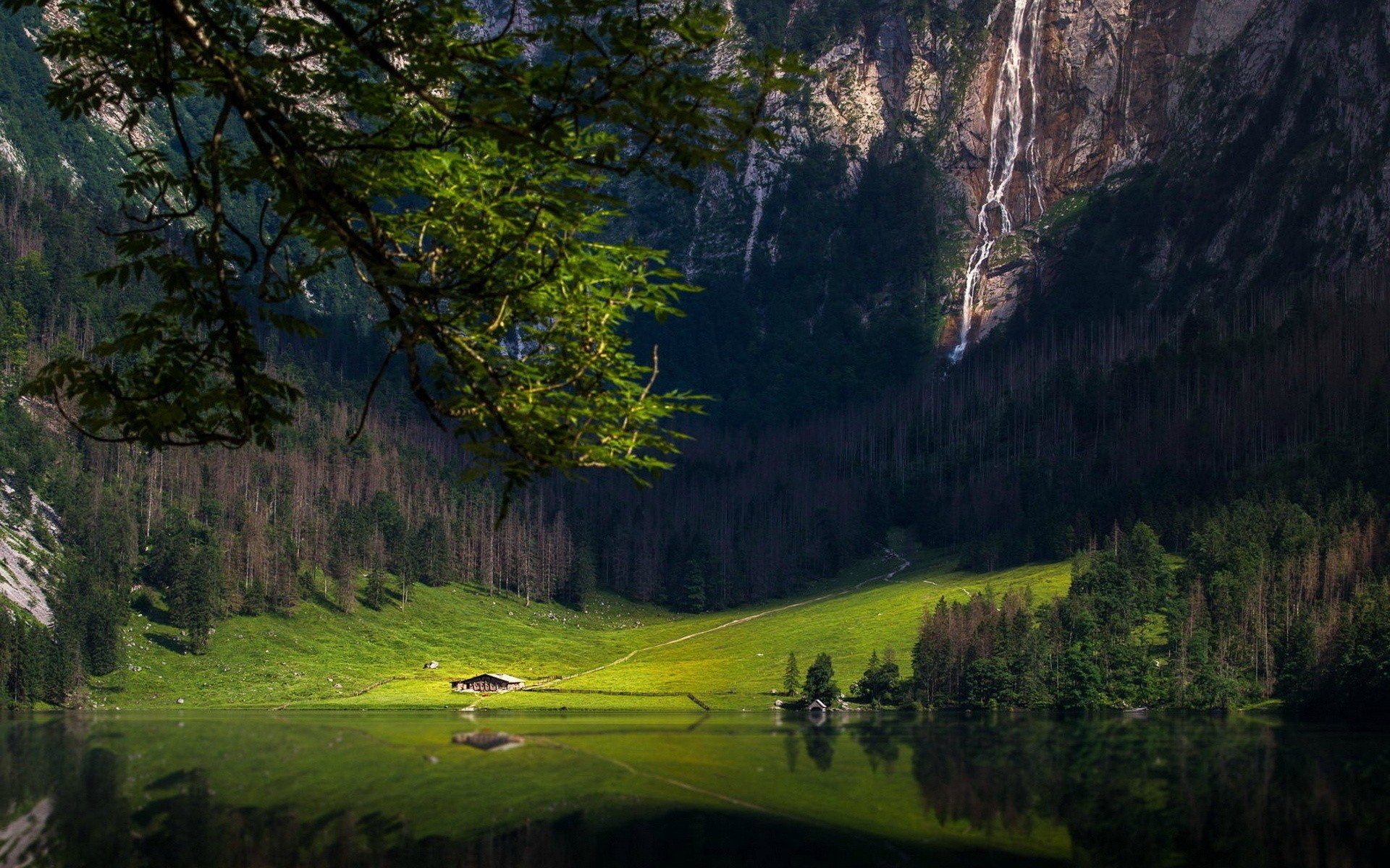 Lake with waterfall and cabin in the mountains HD Wallpaper