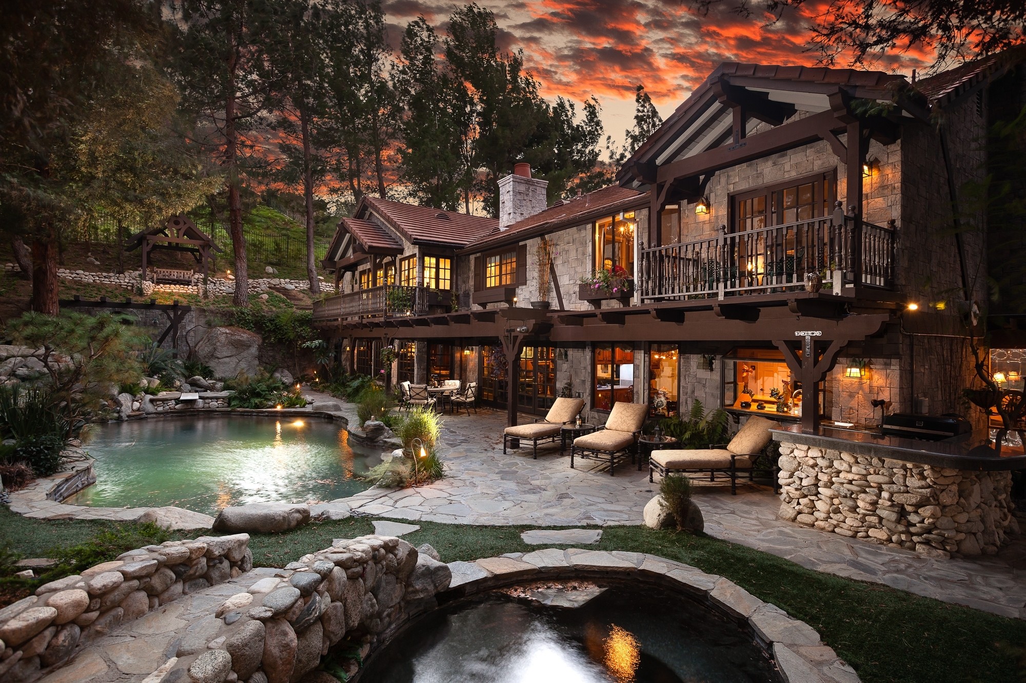Luxury house with pool and hot tub at sunset HD Wallpaper