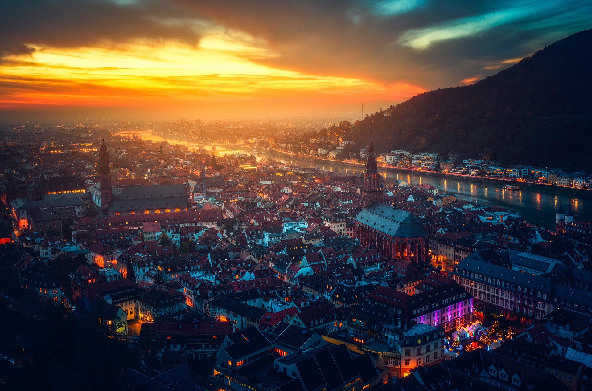 Heidelberg cityscape at sunset with river and mountains HD Wallpaper