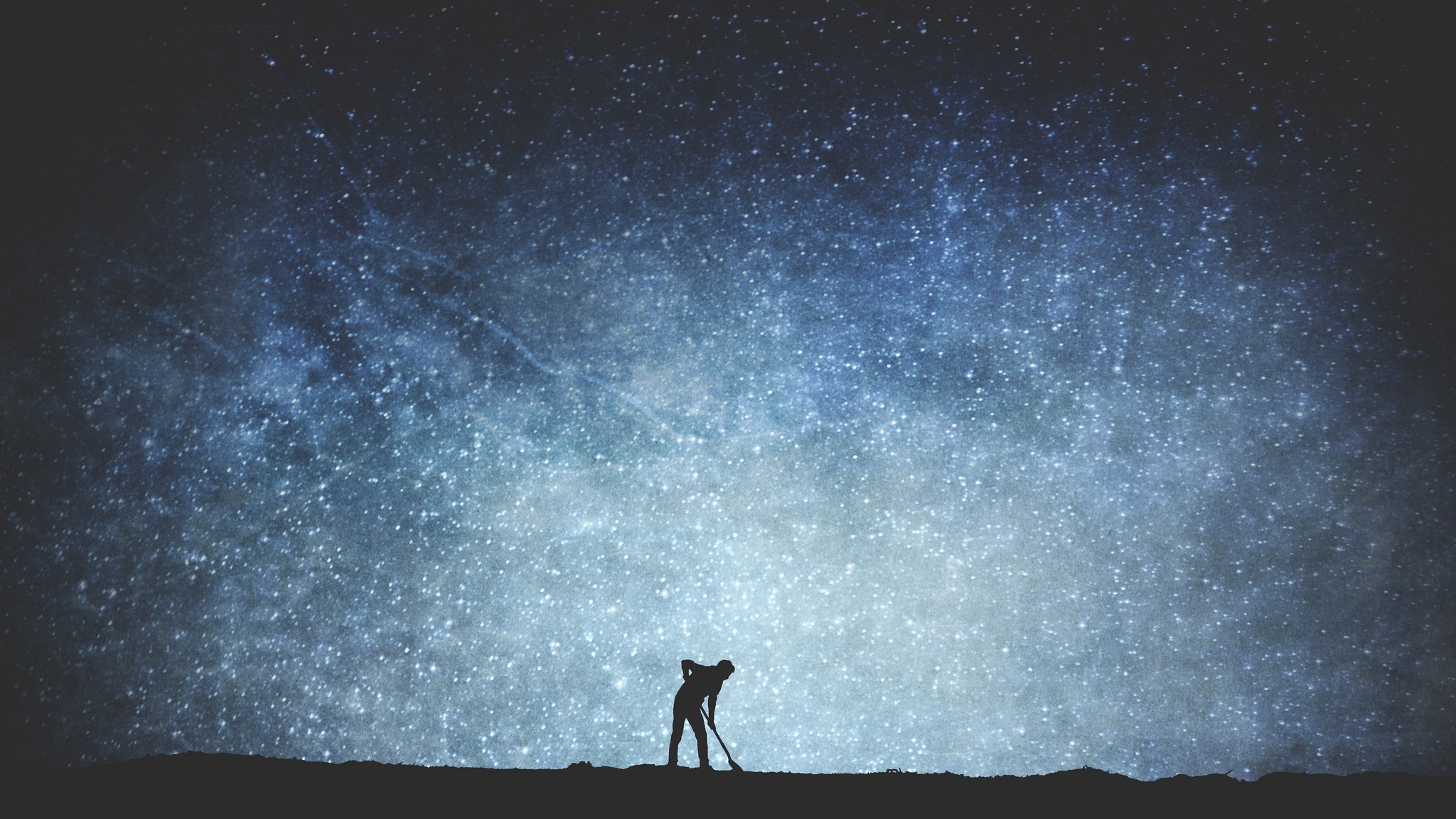 Silhouette of a person digging under a starry sky HD Wallpaper