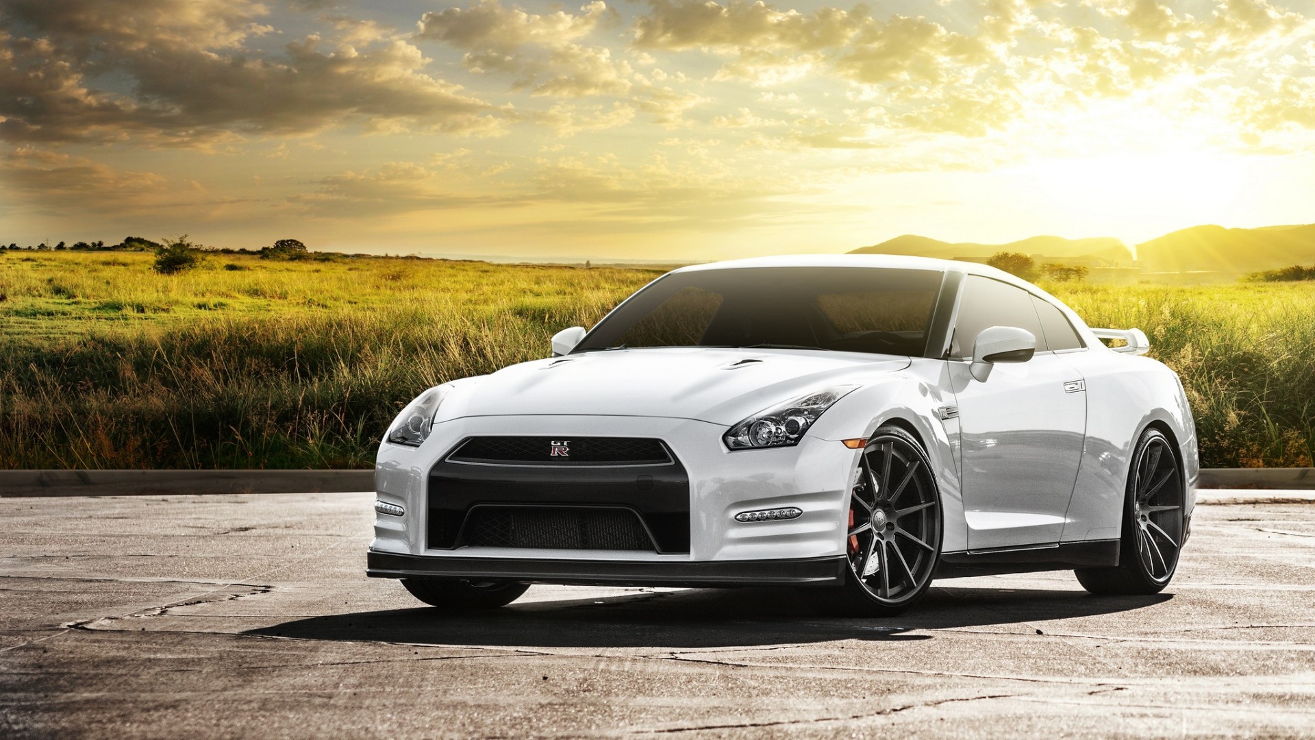 White Nissan GT-R R35 parked on asphalt HD Wallpaper