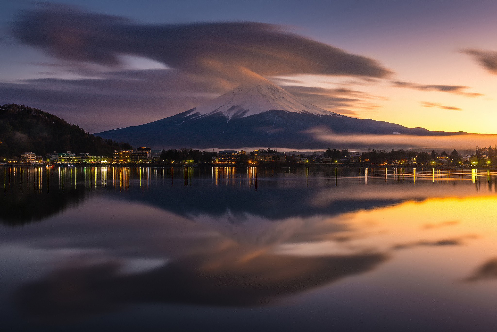 Mount Fuji at sunset reflected in a lake HD Wallpaper