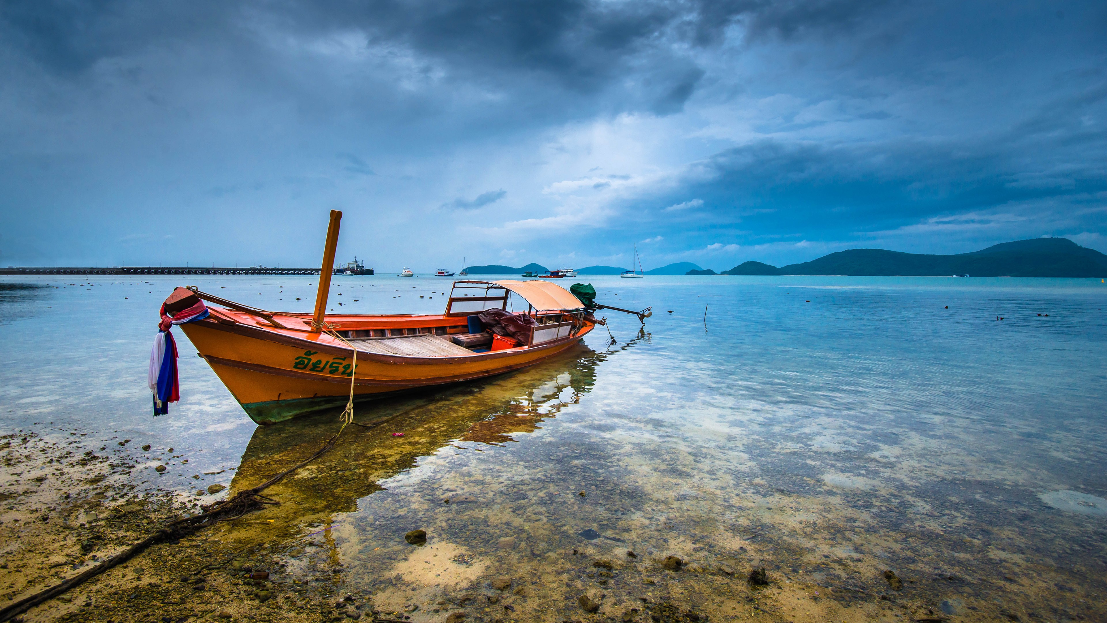 Orange boat on the shore in Thailand HD Wallpaper
