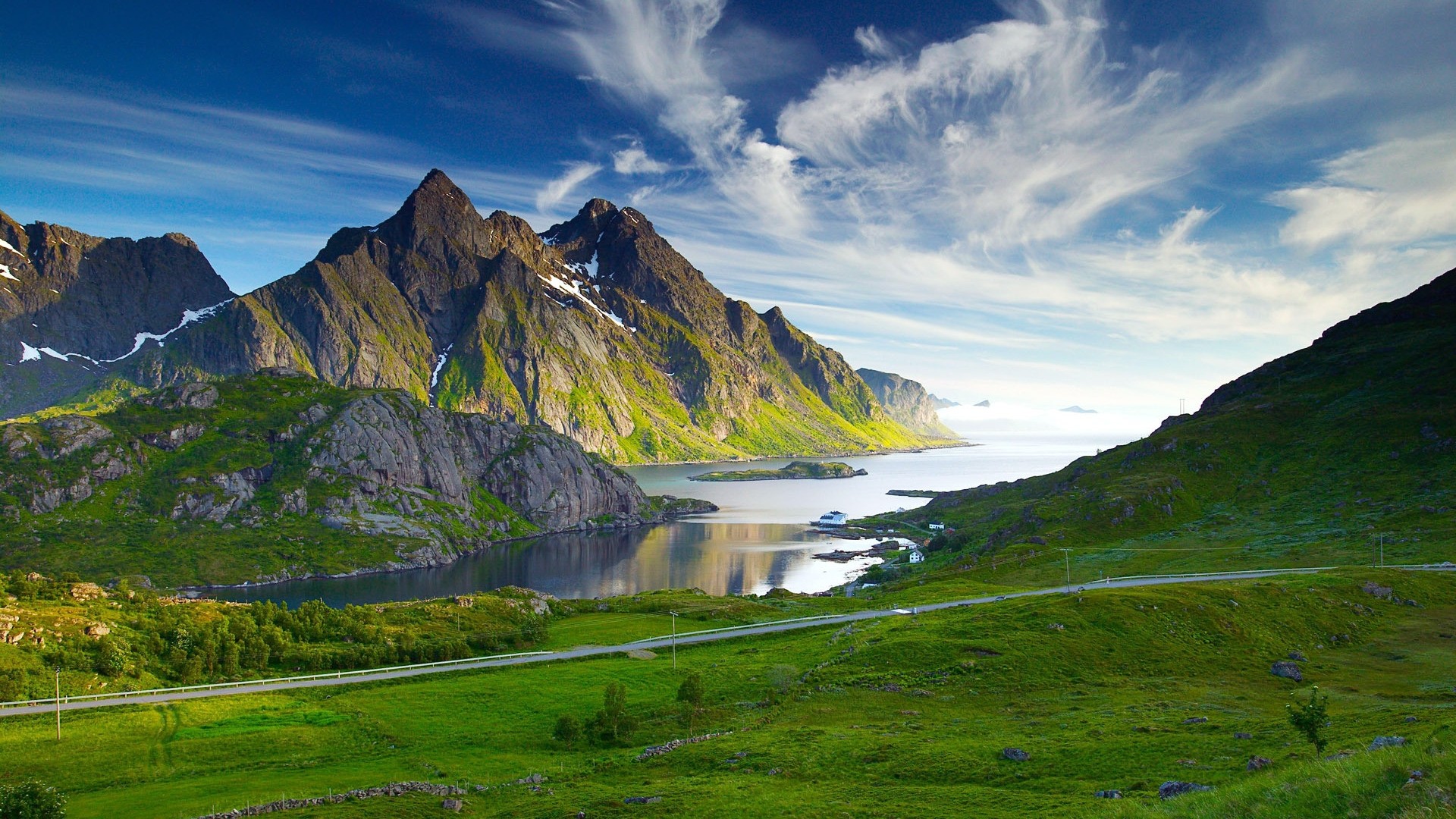 Green mountains and bay with a road HD Wallpaper