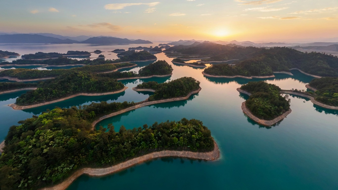 Islands in a lake at sunset in China HD Wallpaper