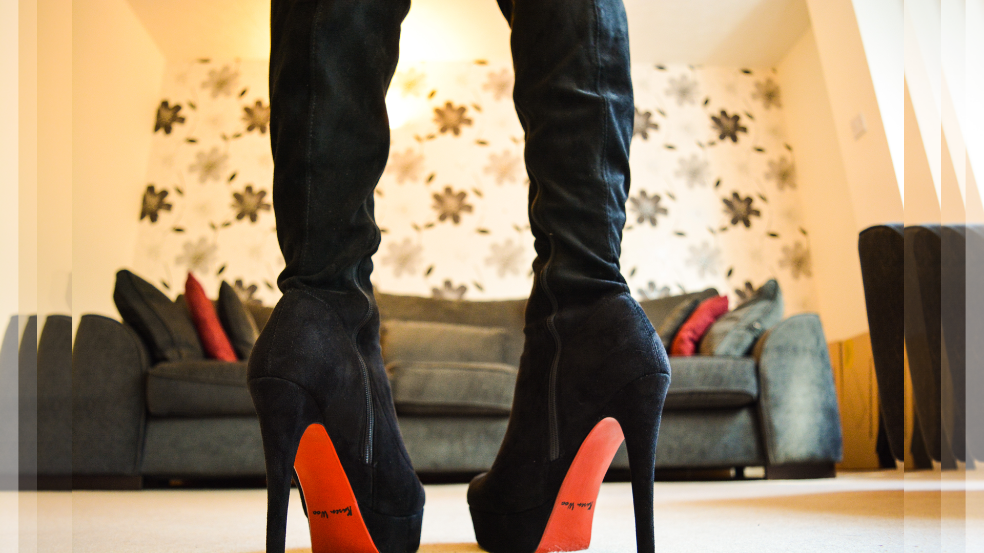Woman wearing black knee-high boots with red soles HD Wallpaper