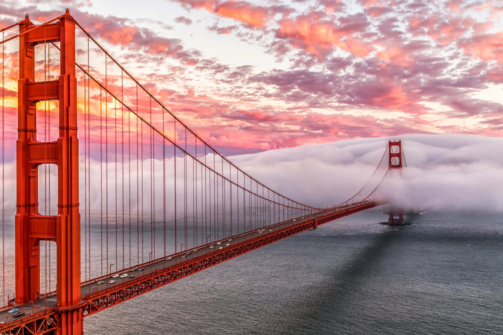 Golden Gate Bridge shrouded in fog at sunset HD Wallpaper