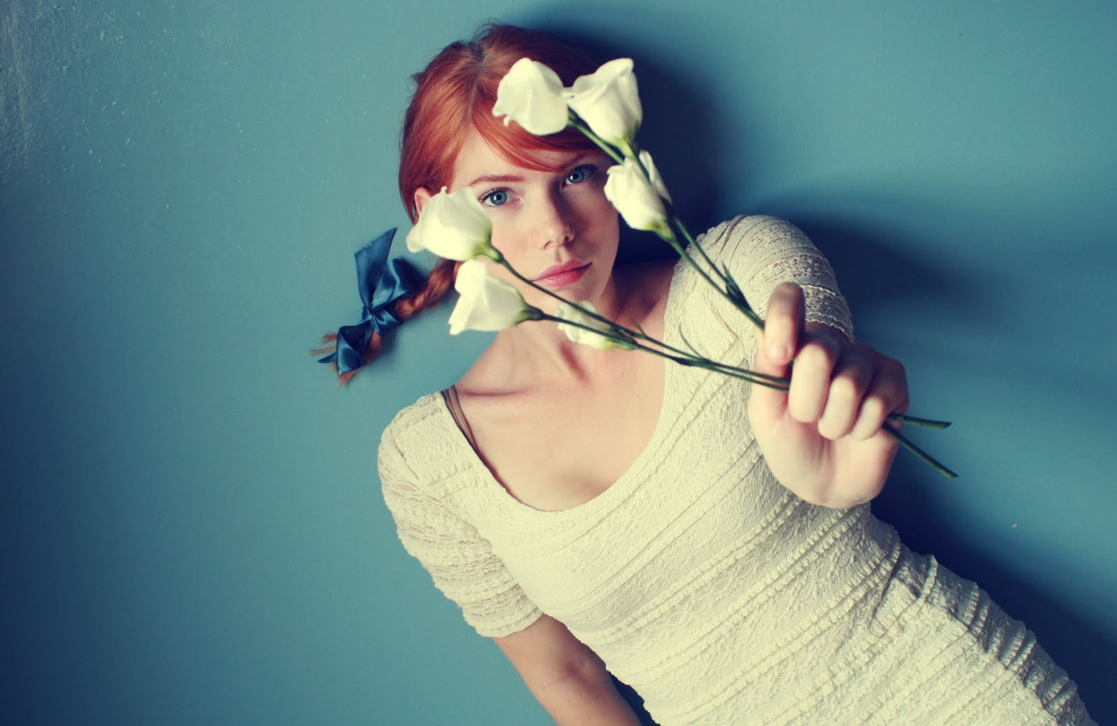 Redhead woman with white flowers and blue bow HD Wallpaper