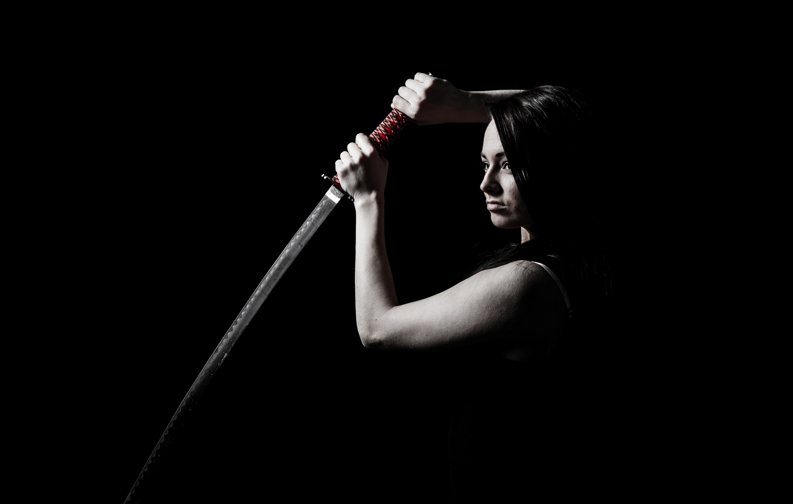 Woman holding a katana sword HD Wallpaper