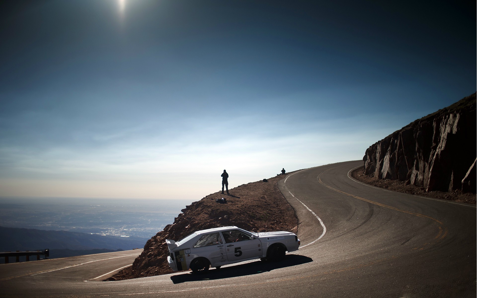 Audi Quattro race car on a mountain road HD Wallpaper