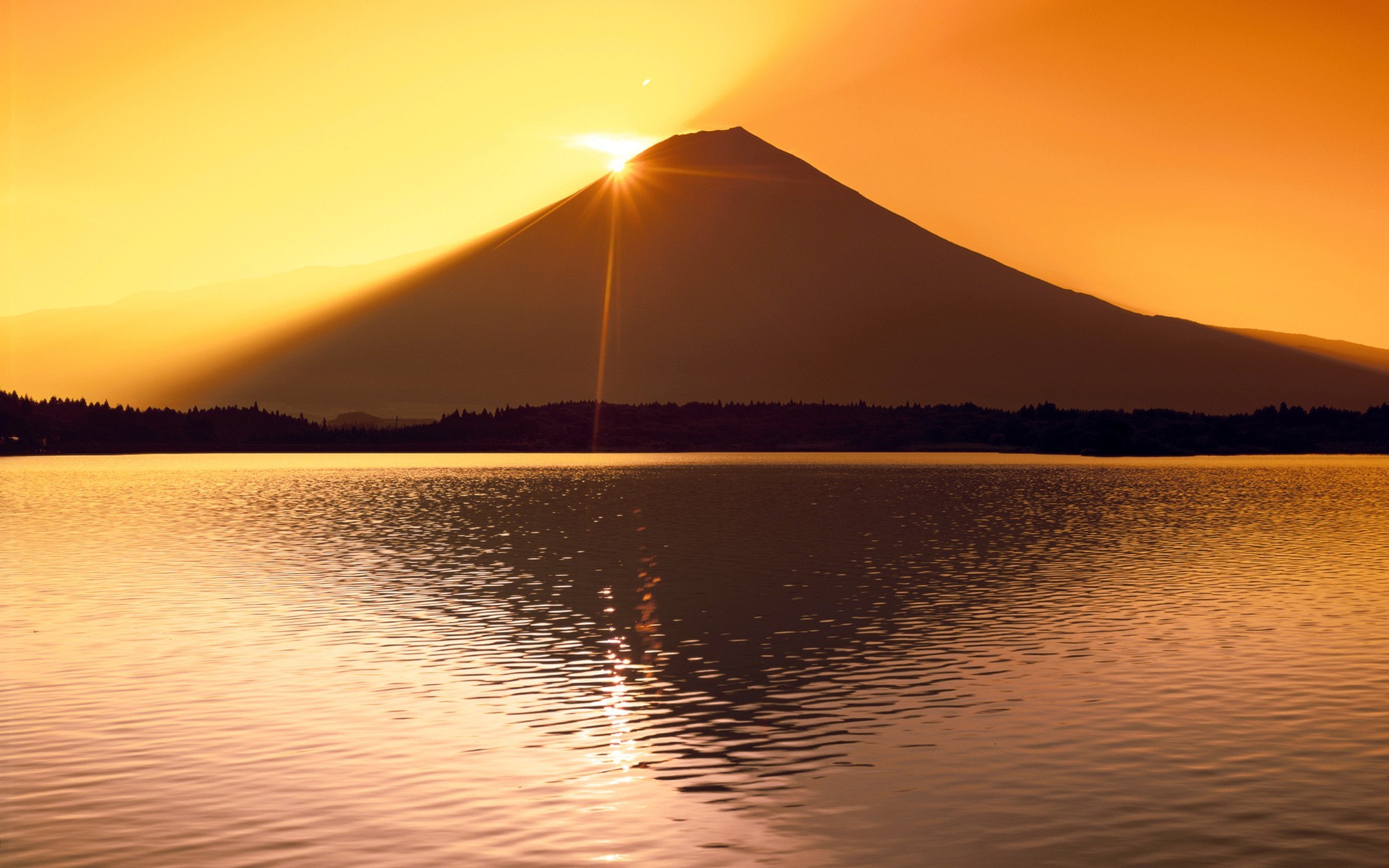Mount Fuji silhouette at sunrise over a lake HD Wallpaper