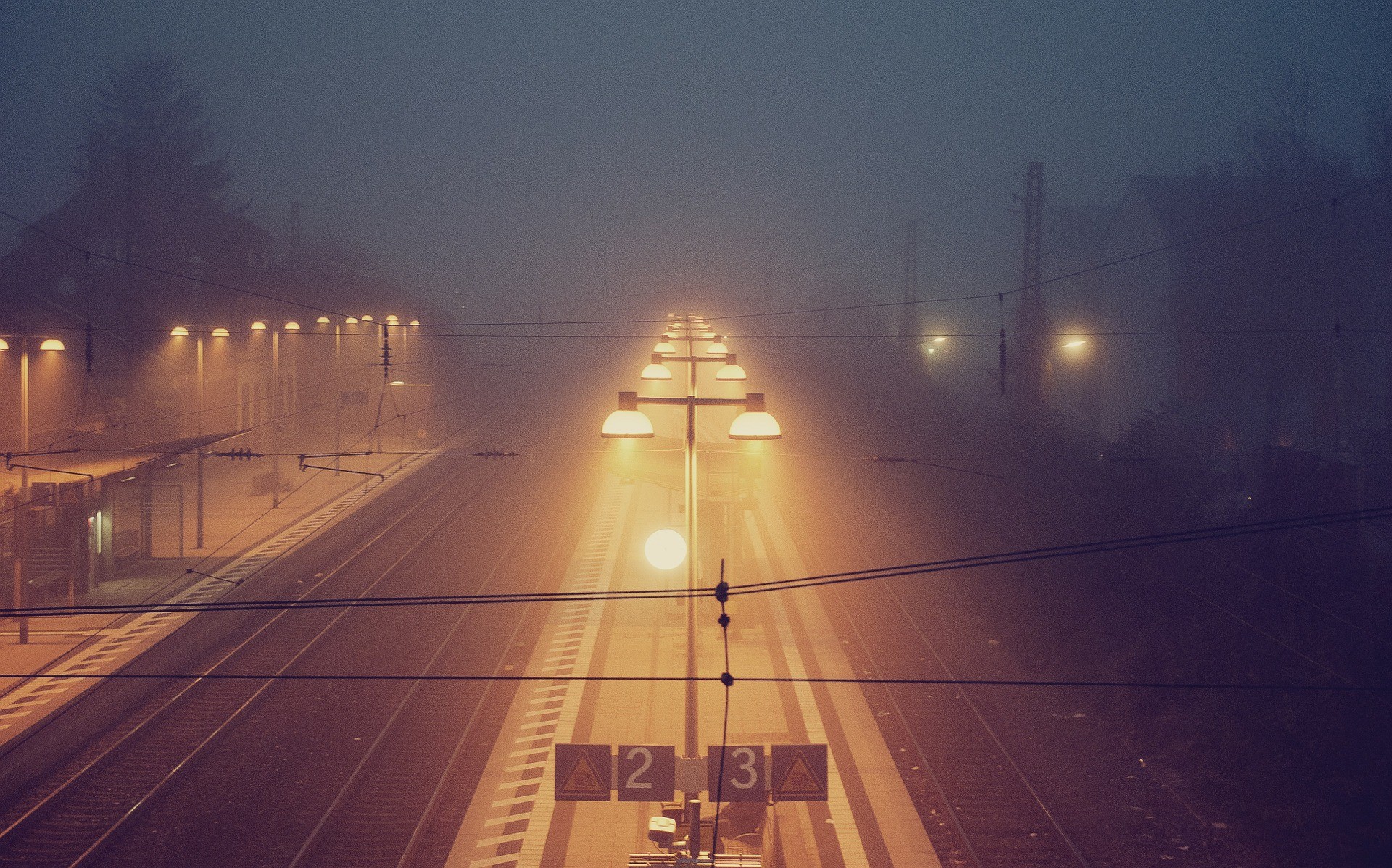 Train station at night in the mist HD Wallpaper